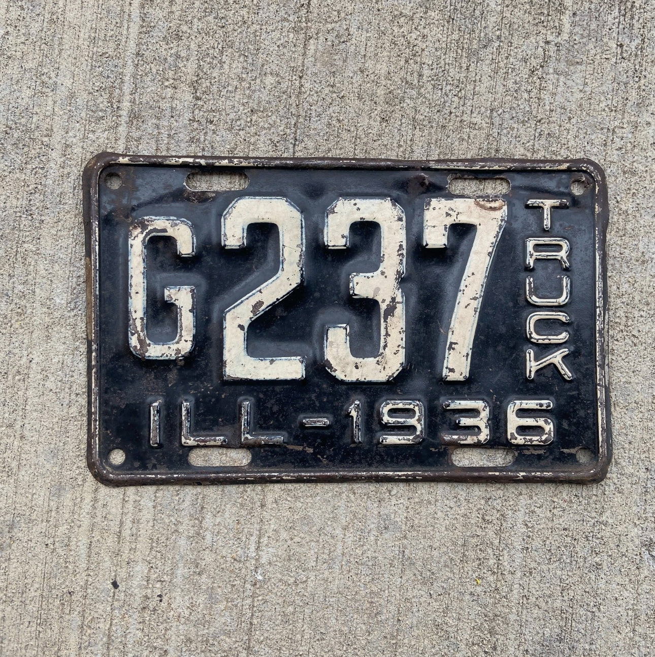 Photo of a 1936 Illinois Truck License Plate Auto Tag Garage Decor Vintage Low Number Three Digit G 237 with original patina