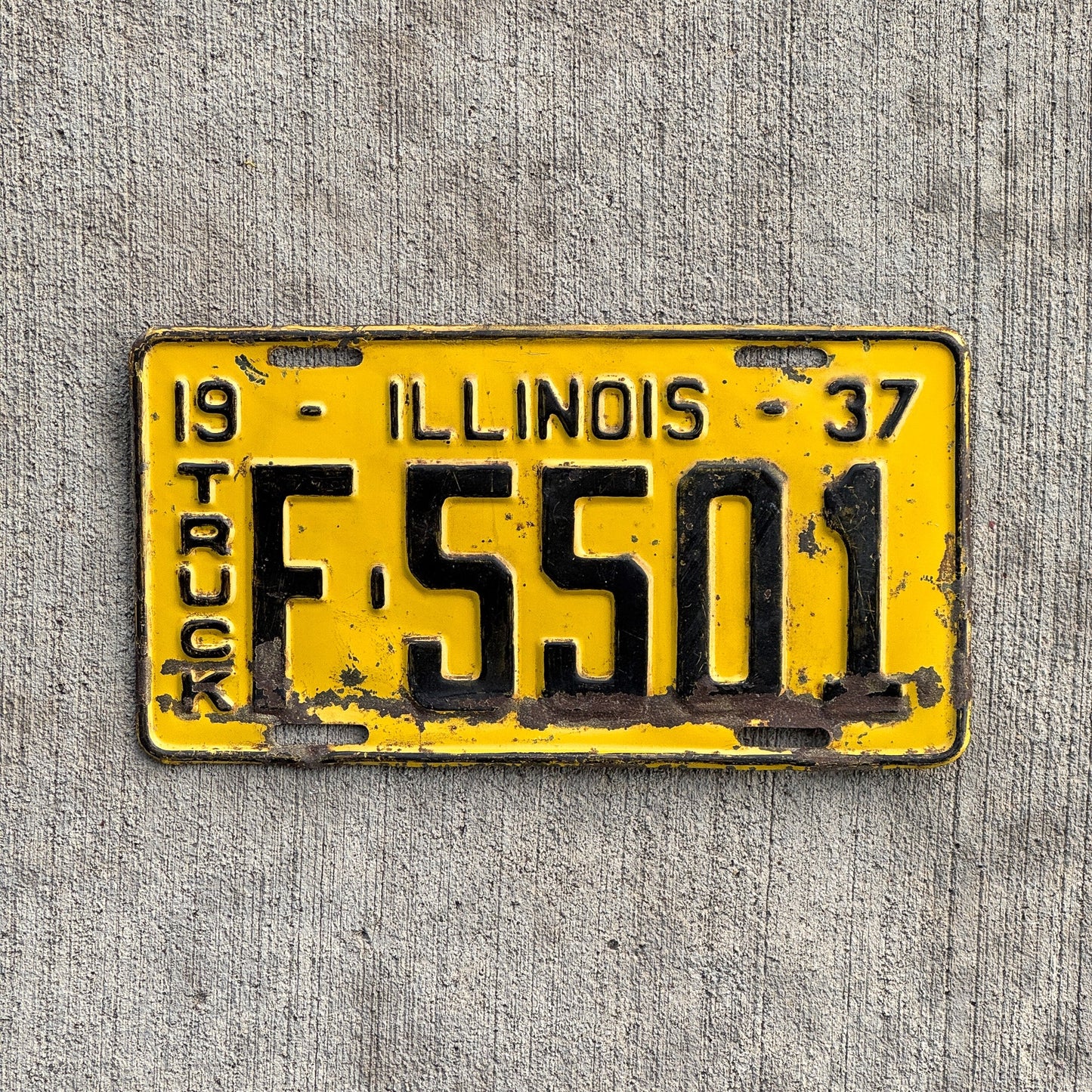 Photo of a 1937 Illinois Truck License Plate Auto Tag Garage Decor Vintage F 5501 with original patina
