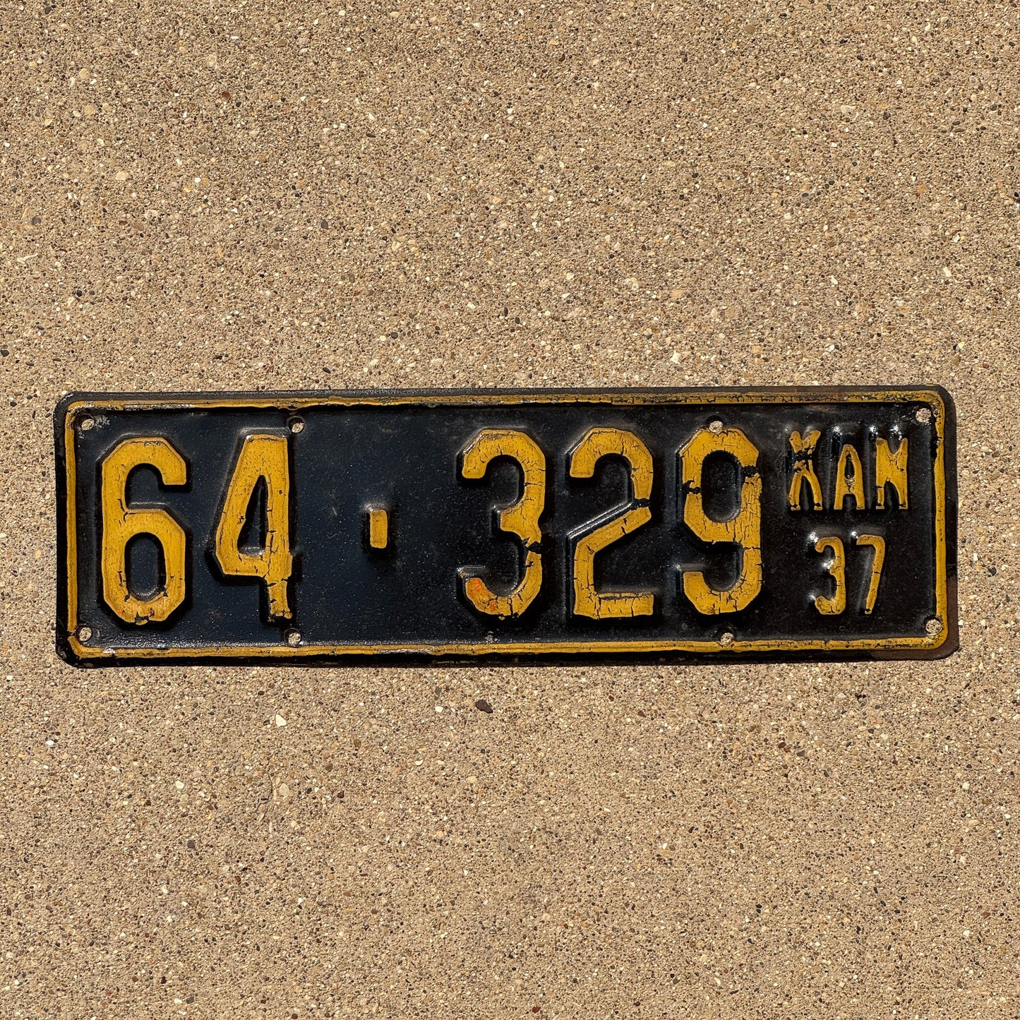 Photo of a 1937 Kansas License Plate Auto Tag Garage Decor Vintage Ellsworth County 64 329