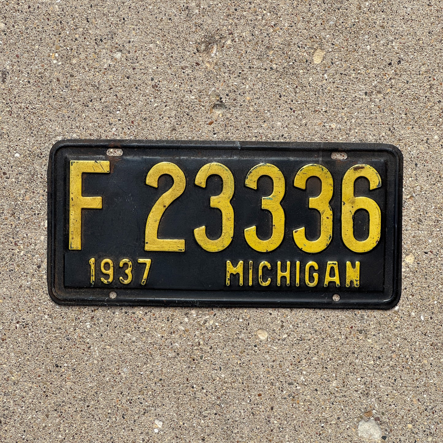 Photo of a 1937 Michigan License Plate Auto Tag Garage Decor Vintage Repeat Repeating F 23336 with original patina