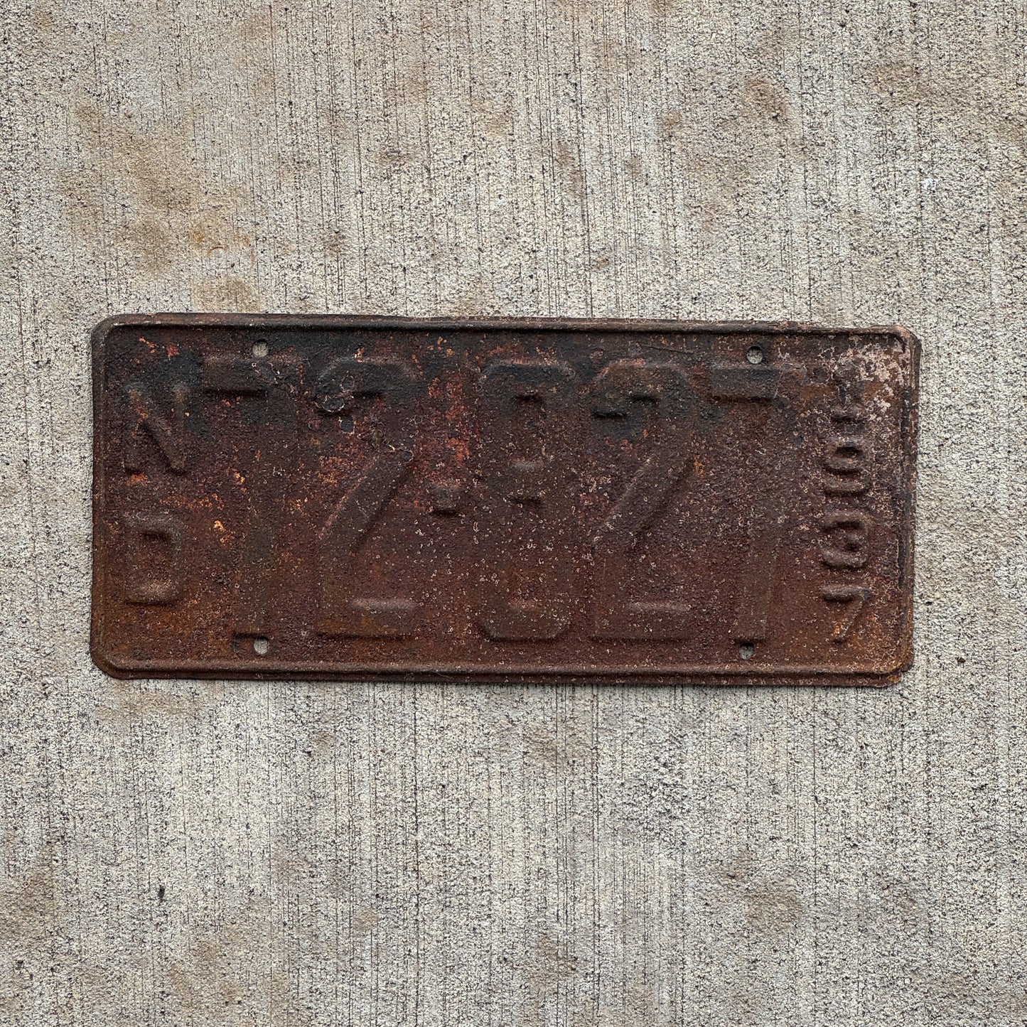 Photo of a 1937 North Dakota License Plate Auto Tag Garage Decor Vintage 72 827 with original patina