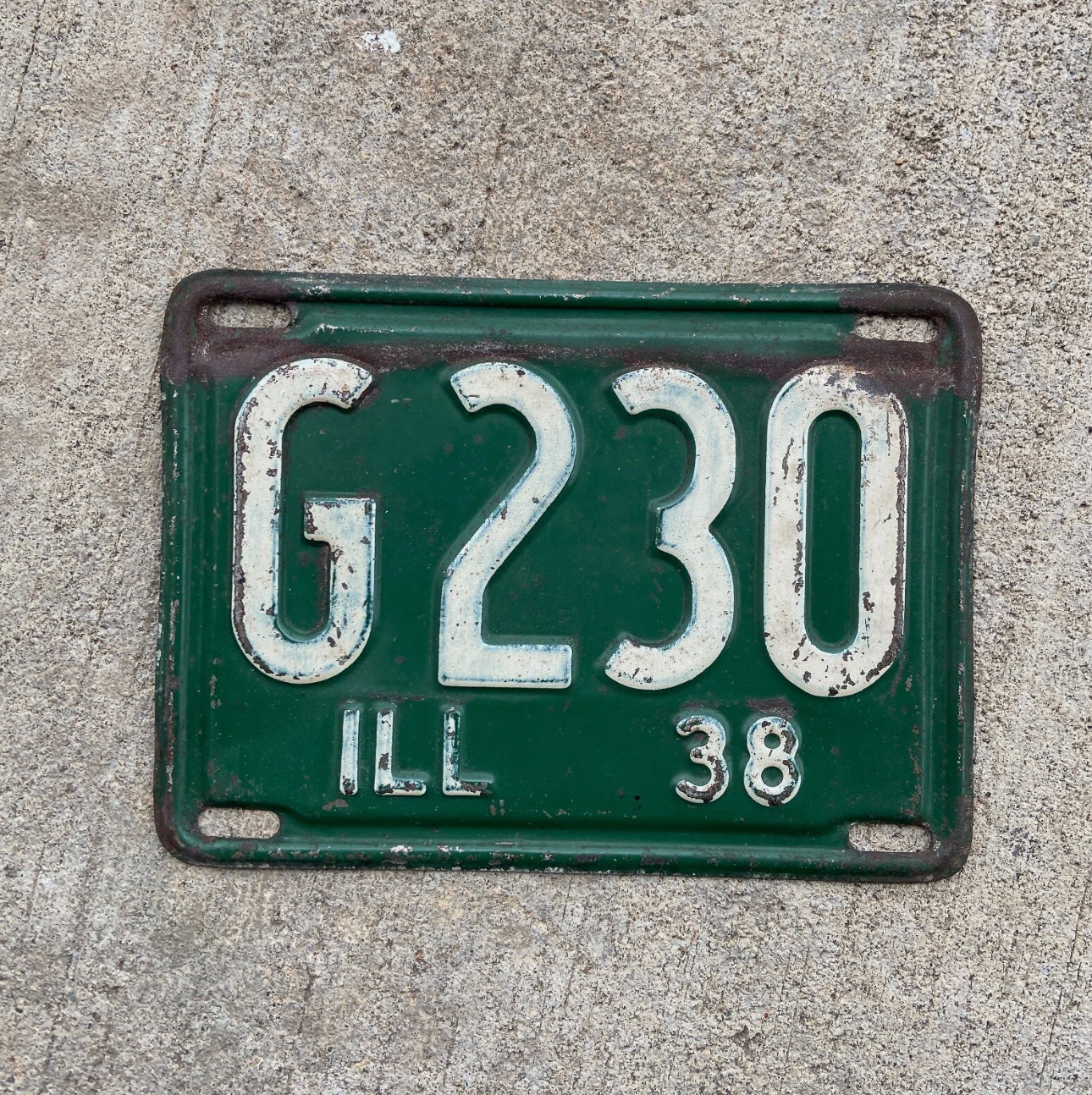 Photo of a 1938 Illinois Truck License Plate Auto Tag Garage Decor Vintage Low Number Three Digit G 230 with original patina