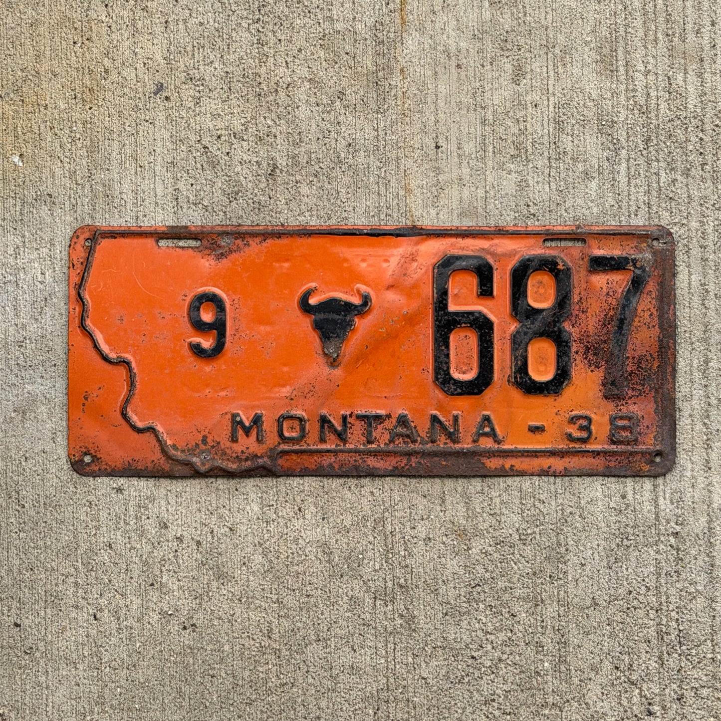 Photo of a 1938 Montana License Plate Auto Tag Garage Decor Vintage State Shape Powder River County 9 687 with original patina