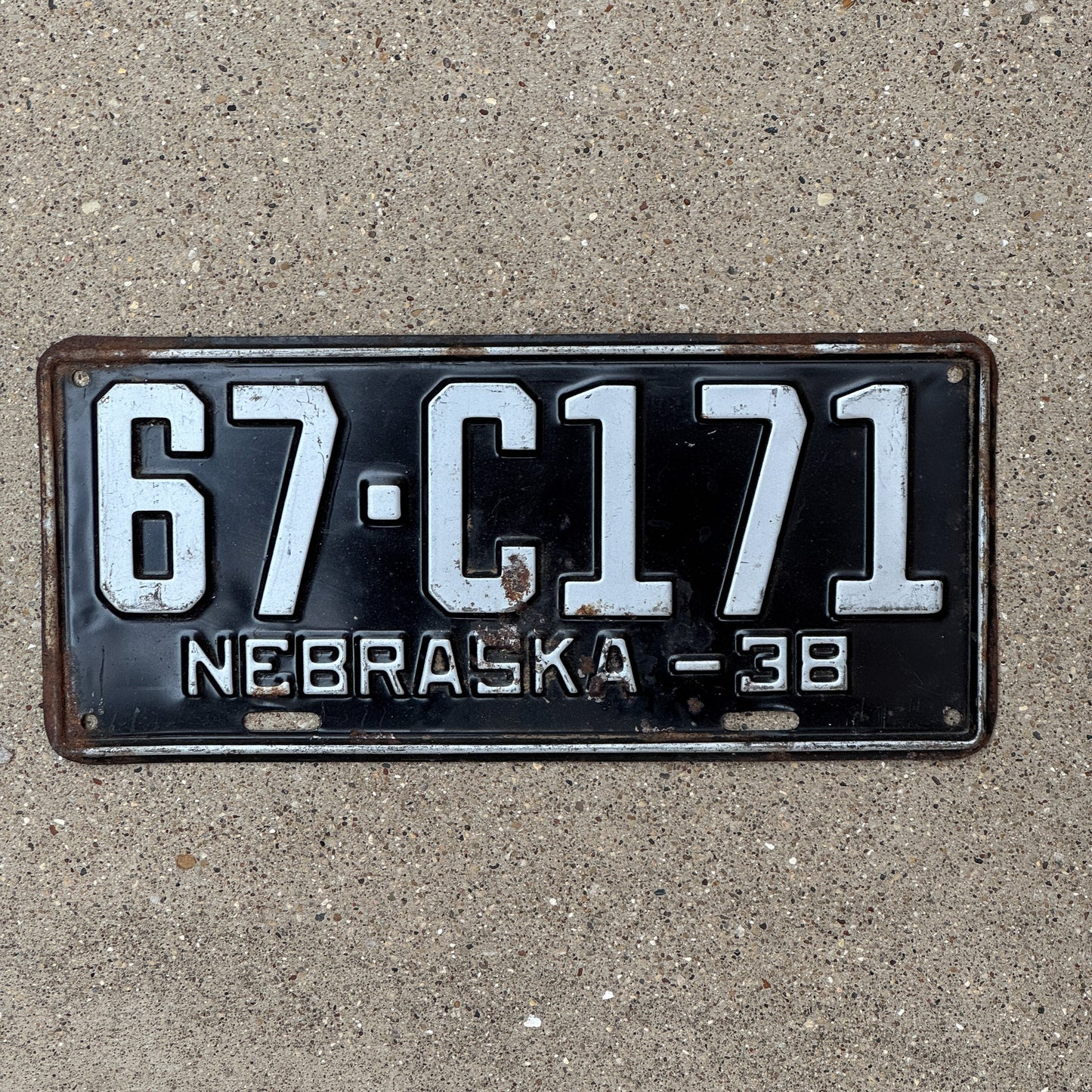 Photo of a 1938 Nebraska Commercial License Plate Auto Tag Garage Decor Vintage 67 C171 with original patina