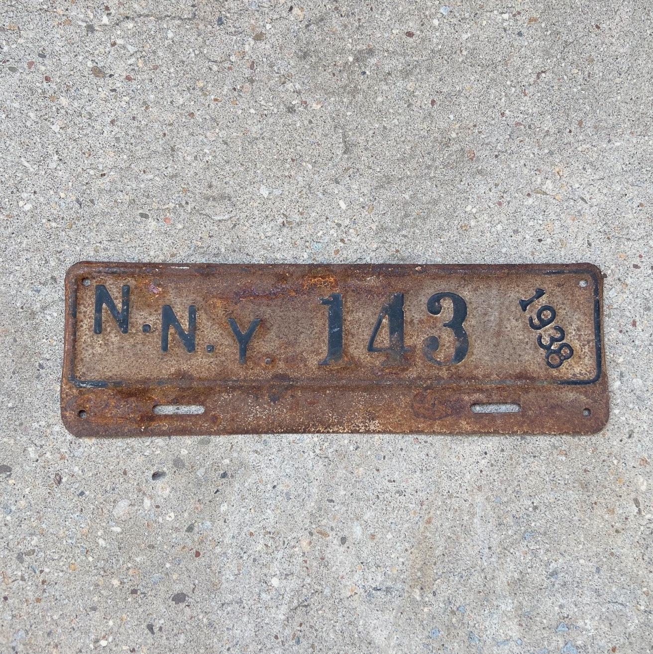 Photo of a 1938 Norfolk Navy Yard Virginia License Plate Topper Auto Tag Garage Decor Vintage NNY Military Naval Fort 143 with original patina