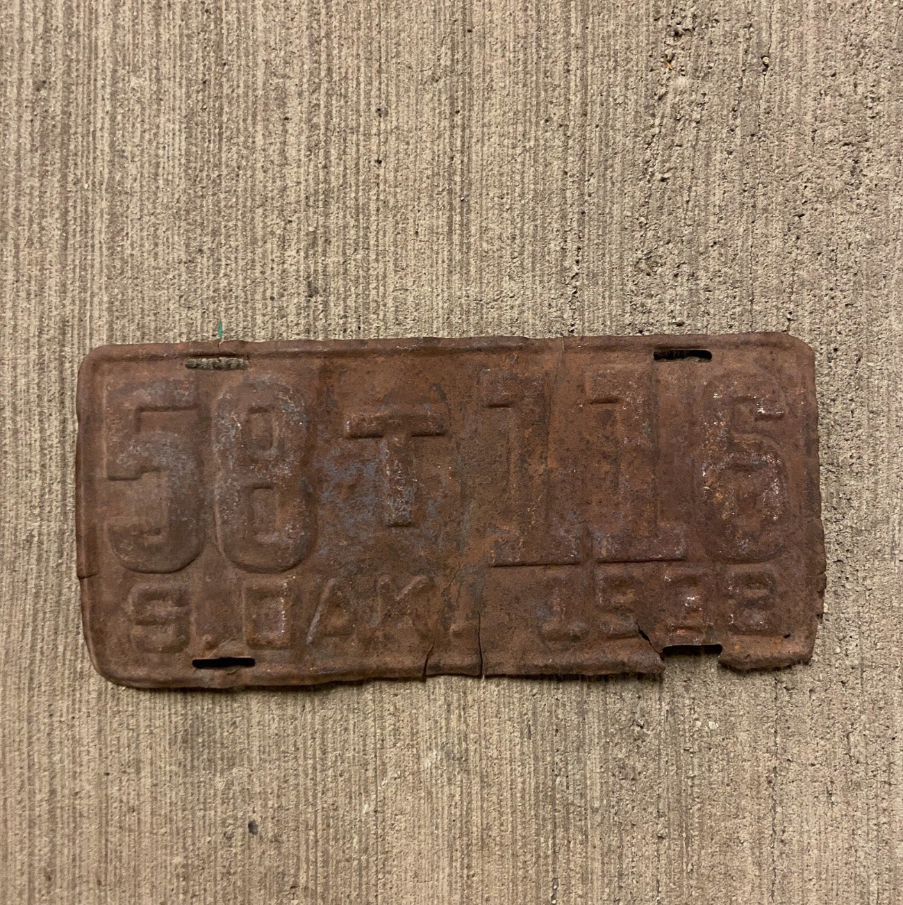 Photo of a 1938 South Dakota Truck License Plate Auto Tag Garage Decor Vintage Rusty 58 T 116