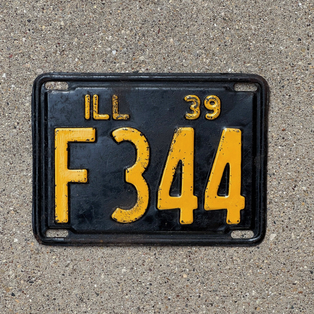 Photo of a 1939 Illinois Truck License Plate Auto Tag Garage Decor Vintage F 344 with original patina