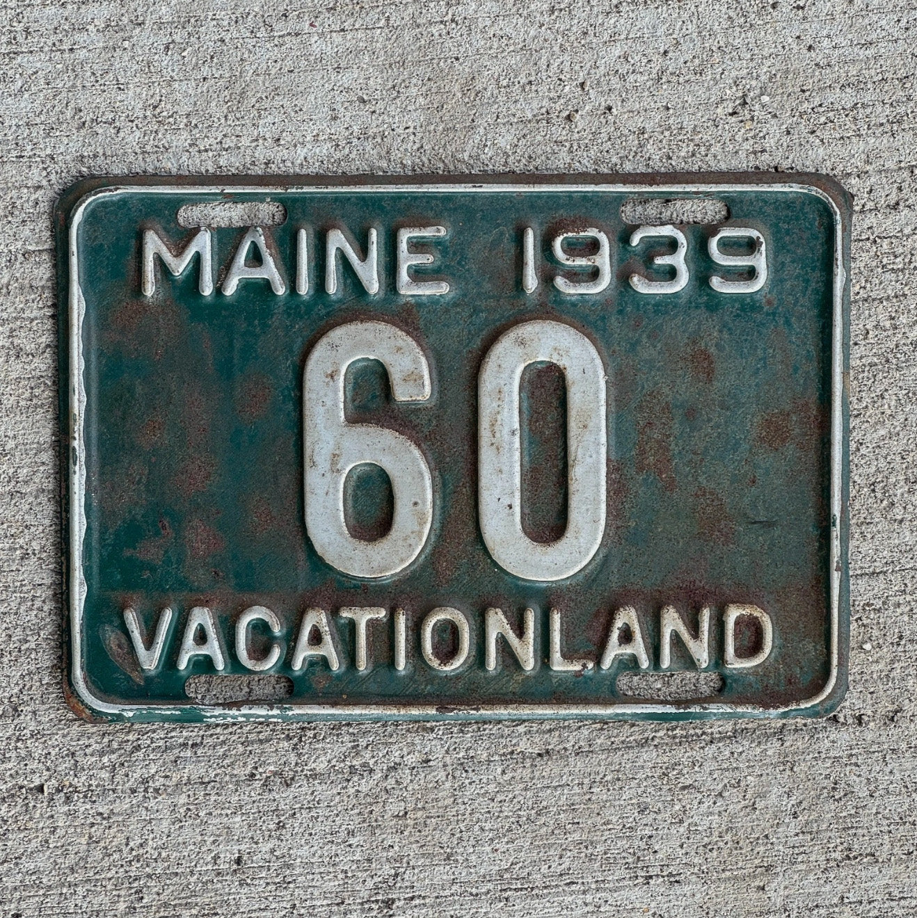 Photo of a 1939 Maine License Plate Auto Tag Garage Decor Vintage Low Number Two Digit 60 with original patina
