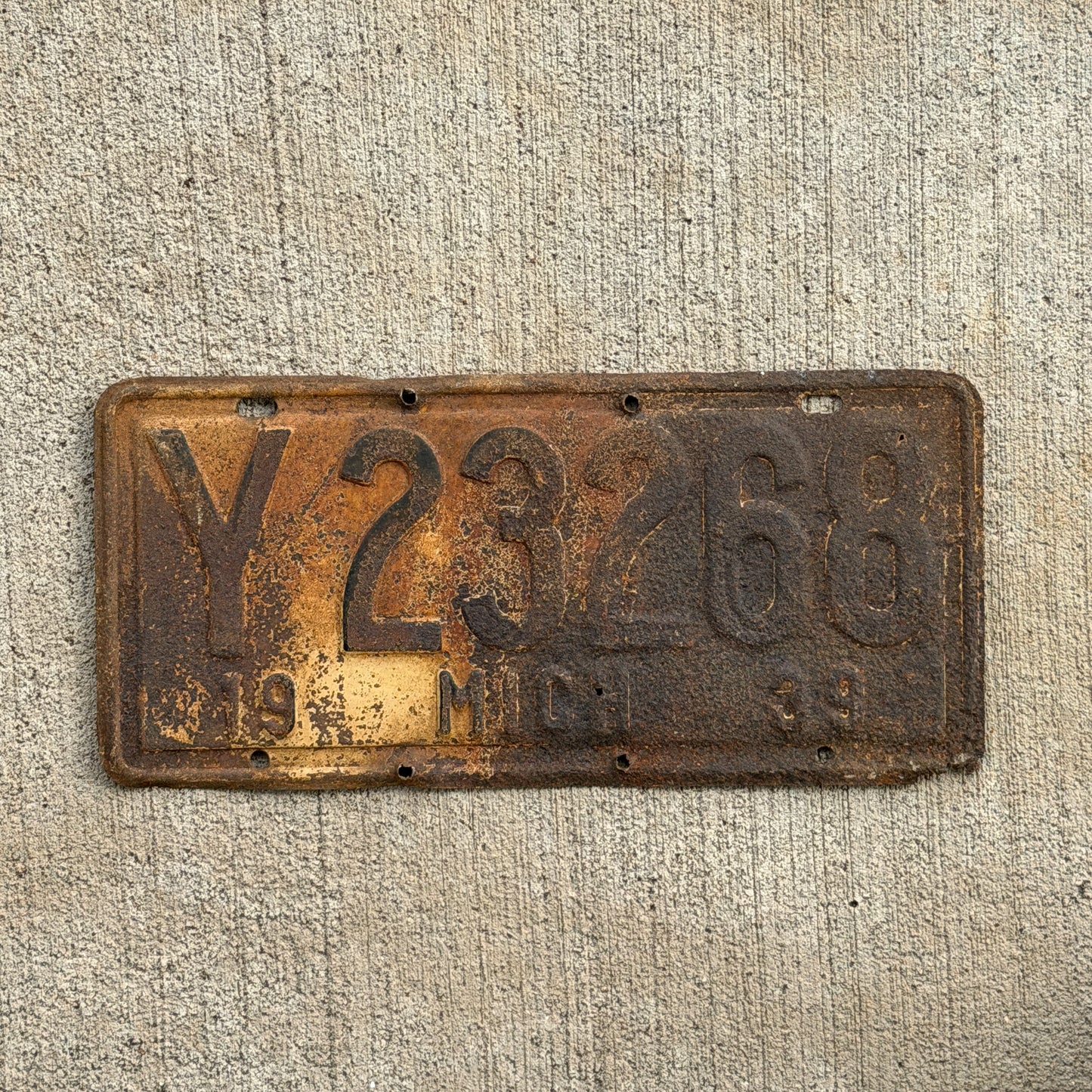 Photo of a 1939 Michigan License Plate Auto Tag Garage Decor Vintage Y 23268 with original patina