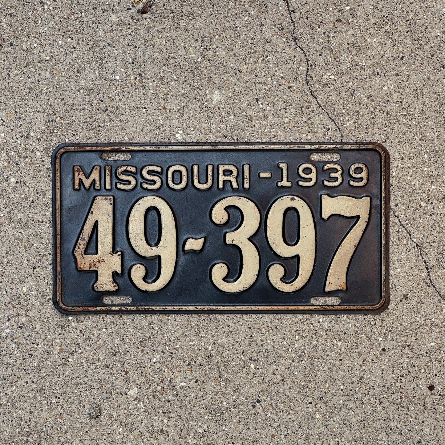 Photo of a 1939 Missouri License Plate Auto Tag Garage Decor Vintage 49 397 with original patina