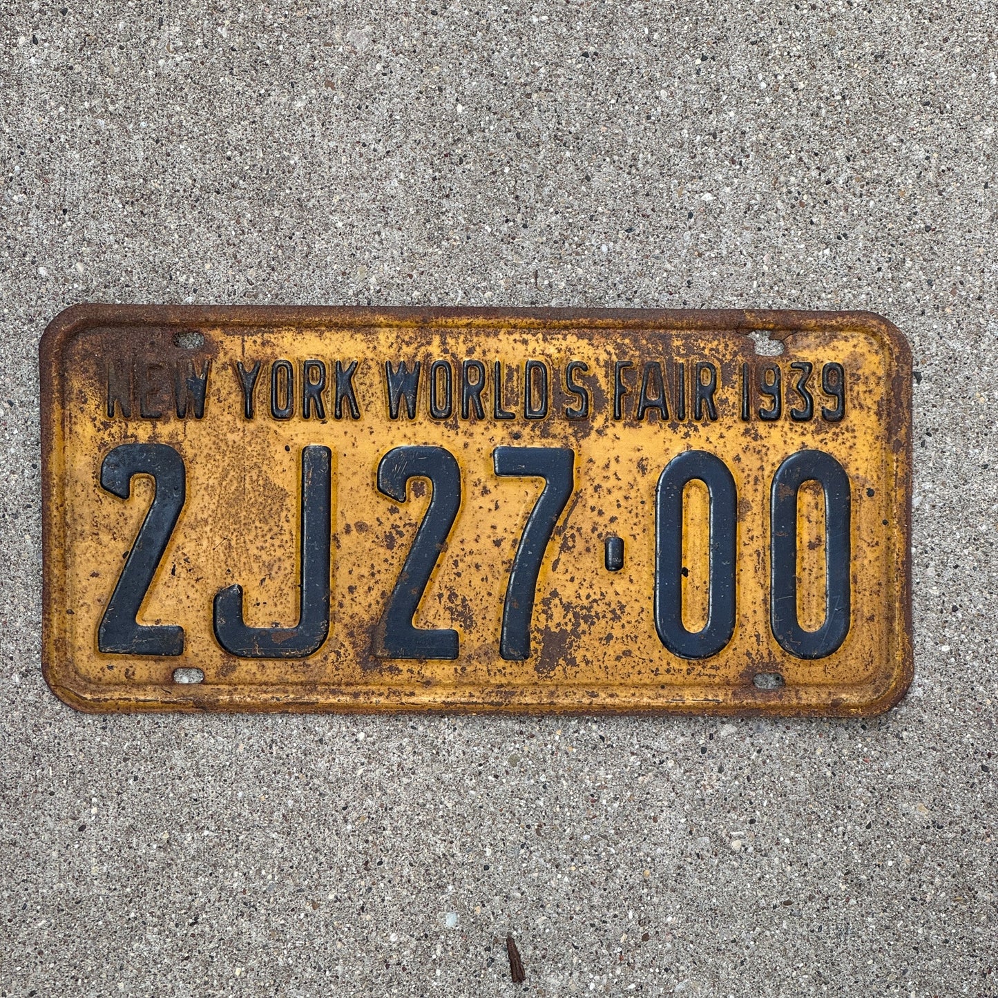 Photo of a 1939 New York License Plate Auto Tag Garage Decor Vintage World's Fair 2J 2700