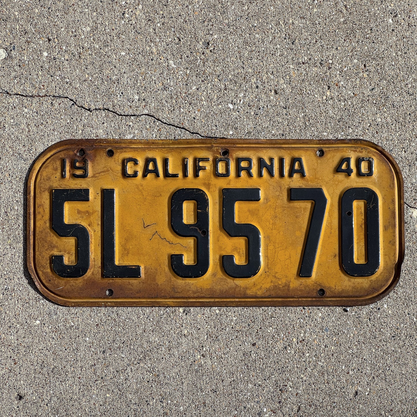 Photo of a 1940 California License Plate Auto Tag Garage Decor Vintage 5L 95 70 with original patina