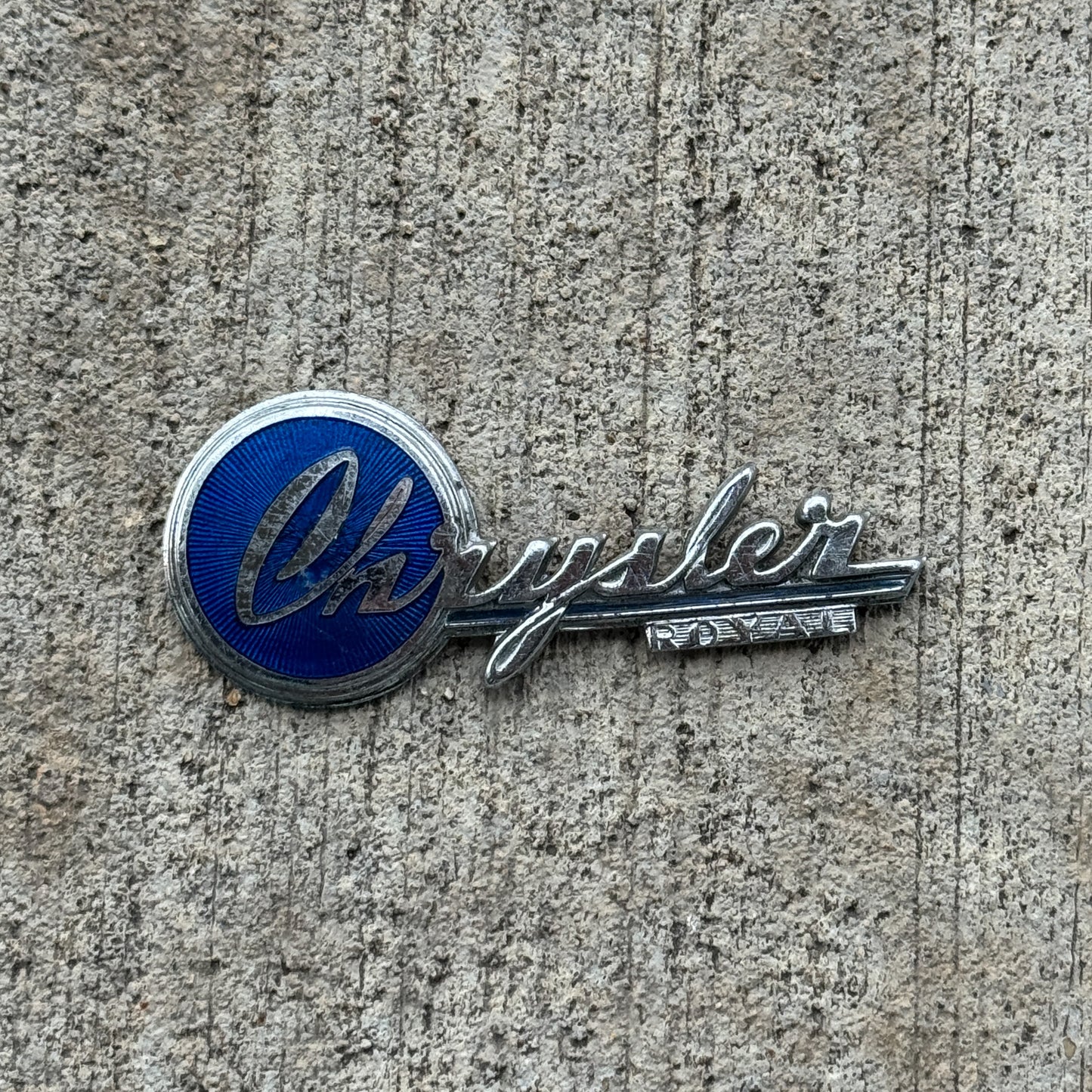 Photo of a 1940 Era Chrysler Royal Badge Emblem Auto Tag Garage Decor Vintage Ornament with original patina