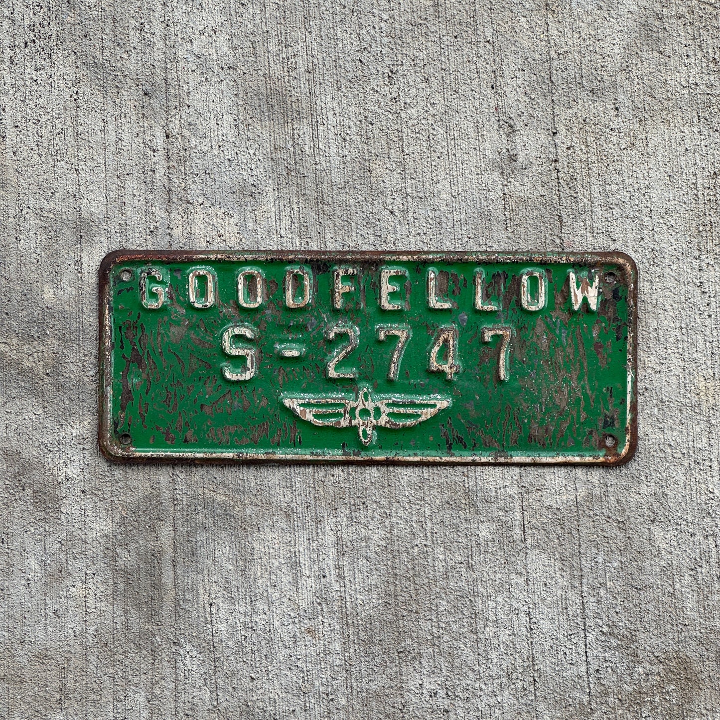 Photo of a 1940 Era Goodfellow Airforce Base Texas License Plate Topper Auto Tag Garage Decor Vintage Goodfellow S-2747 with original patina