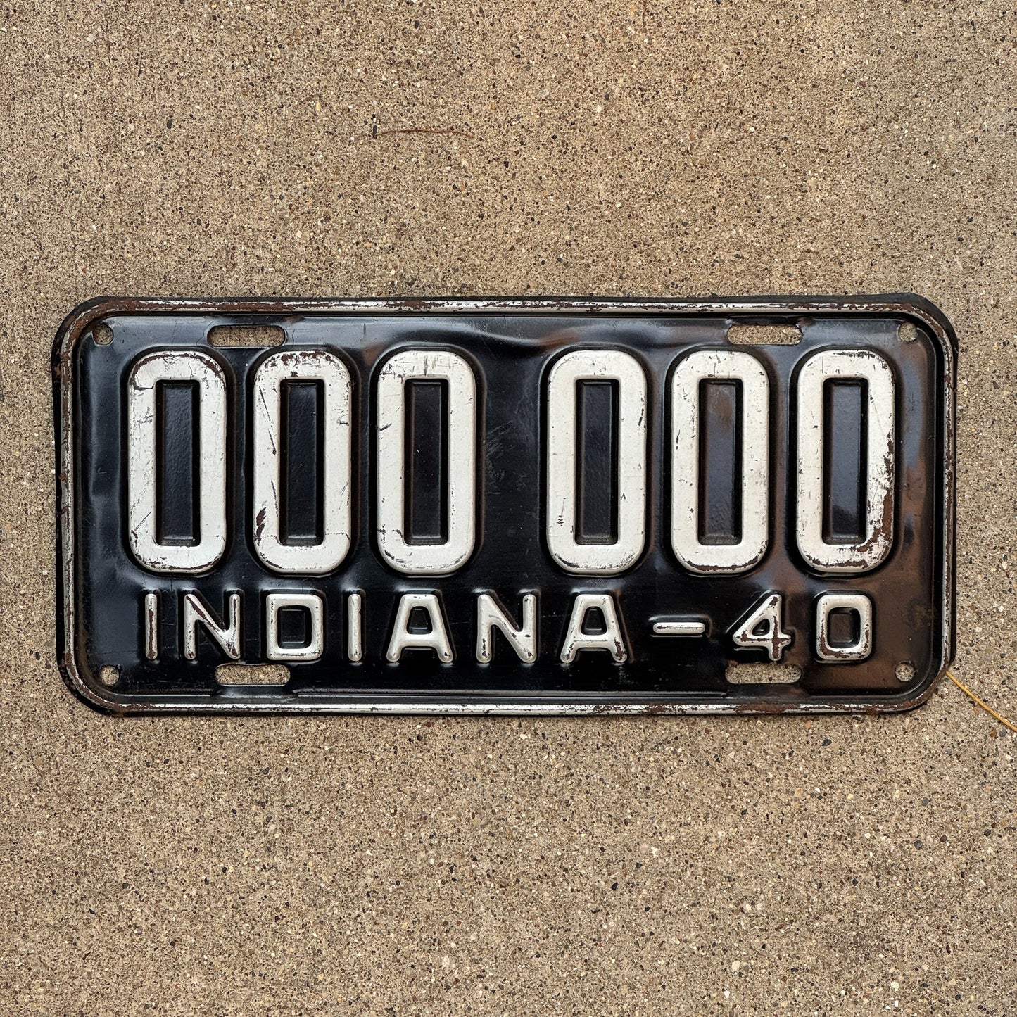 Photo of a 1940 Indiana Sample License Plate Auto Tag Garage Decor Vintage 000 000 with original patina