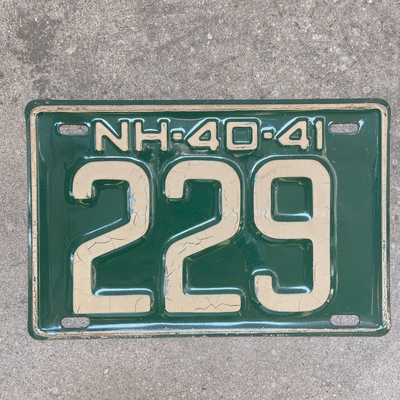 Photo of a 1940 New Hampshire License Plate Auto Tag Garage Decor Vintage Low Number Three Digit 229 with original patina