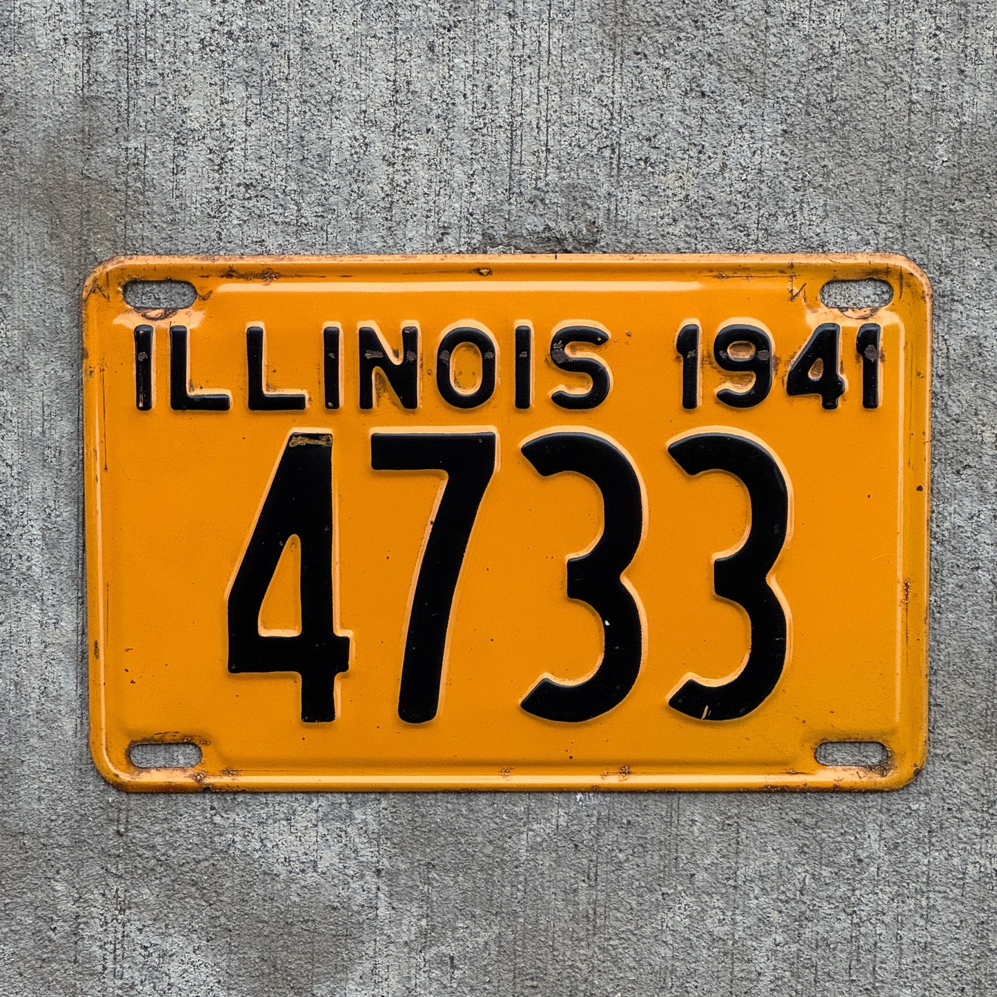 Photo of a 1941 Illinois License Plate Auto Tag Garage Decor Vintage Low Number Four Digit 4733 with original patina