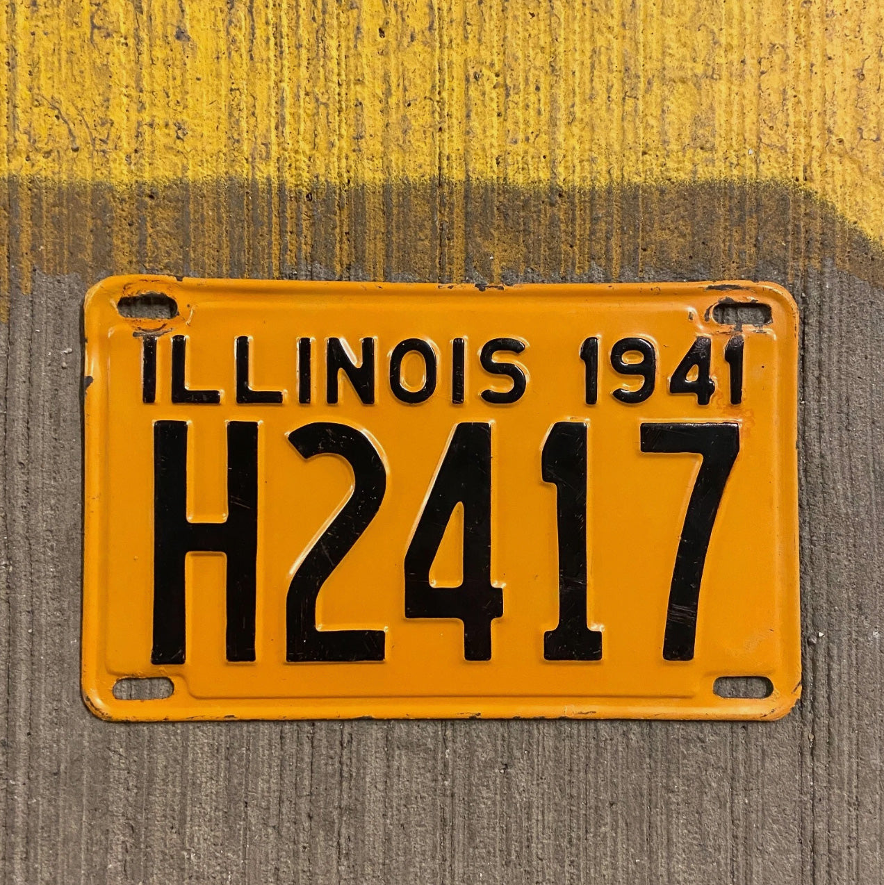 Photo of a 1941 Illinois Truck License Plate Auto Tag Garage Decor Vintage H 2417 with original patina