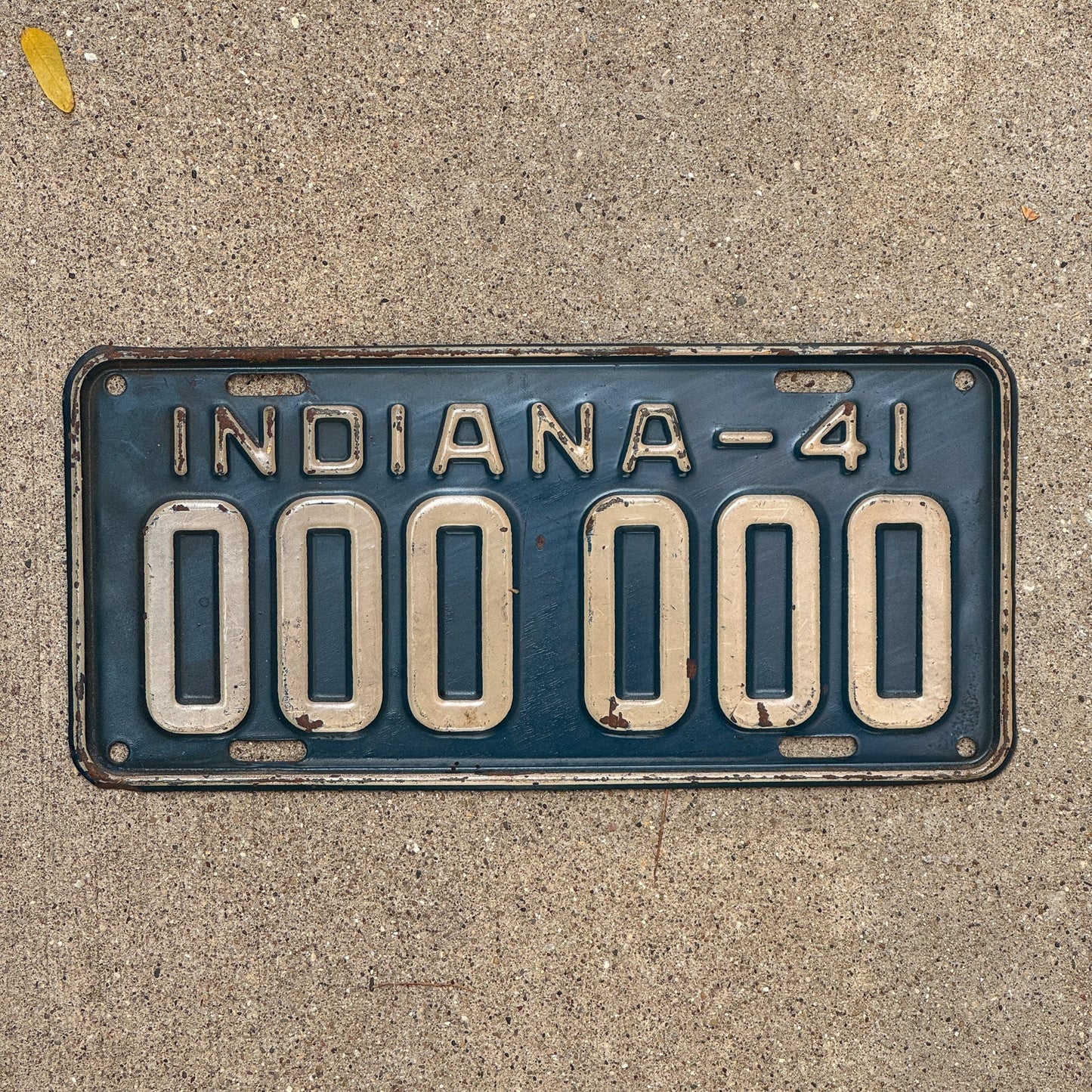 Photo of a 1941 Indiana Sample License Plate Auto Tag Garage Decor Vintage 000 000 with original patina