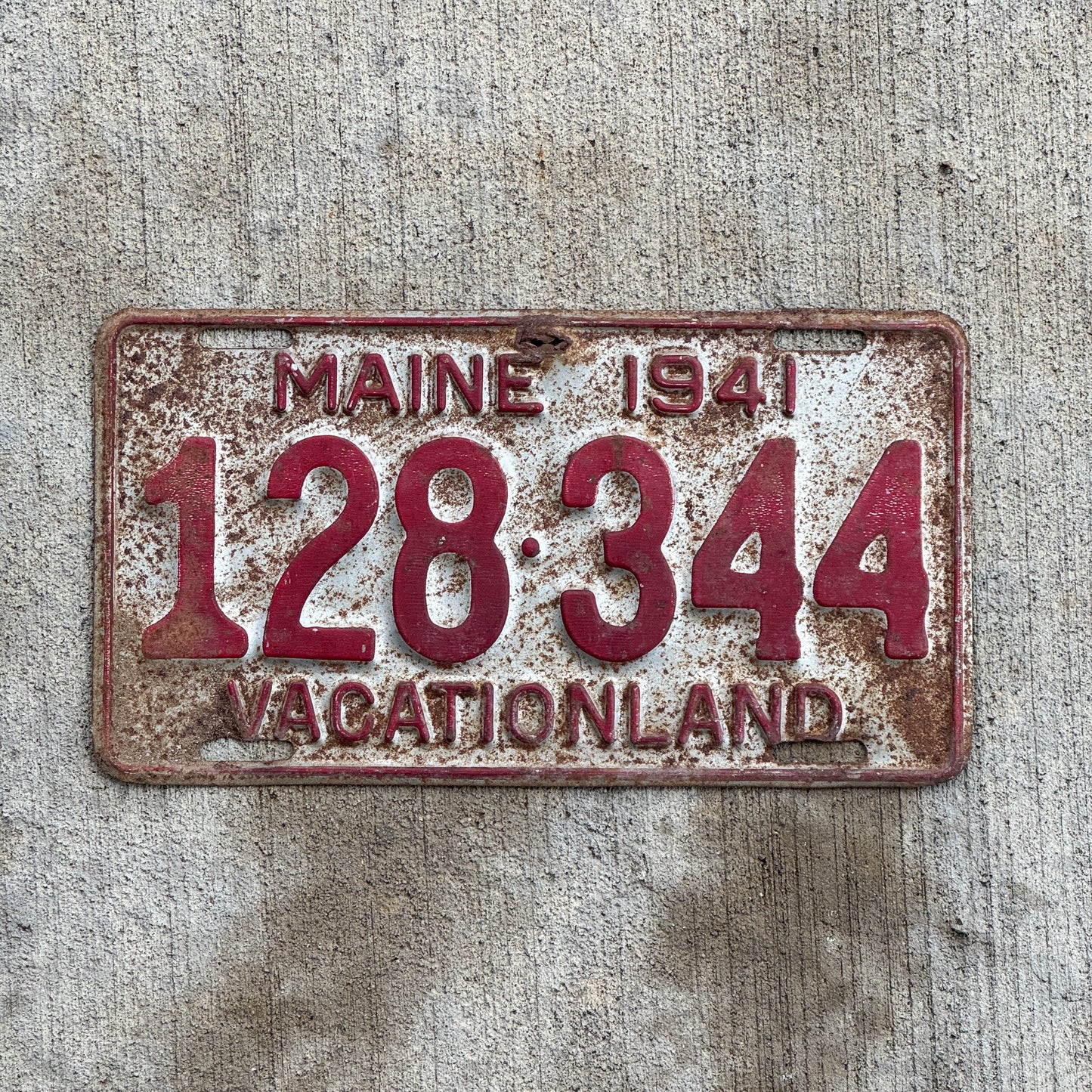 Photo of a 1941 Maine License Plate Auto Tag 2 Vintage Garage 128 344 with original patina