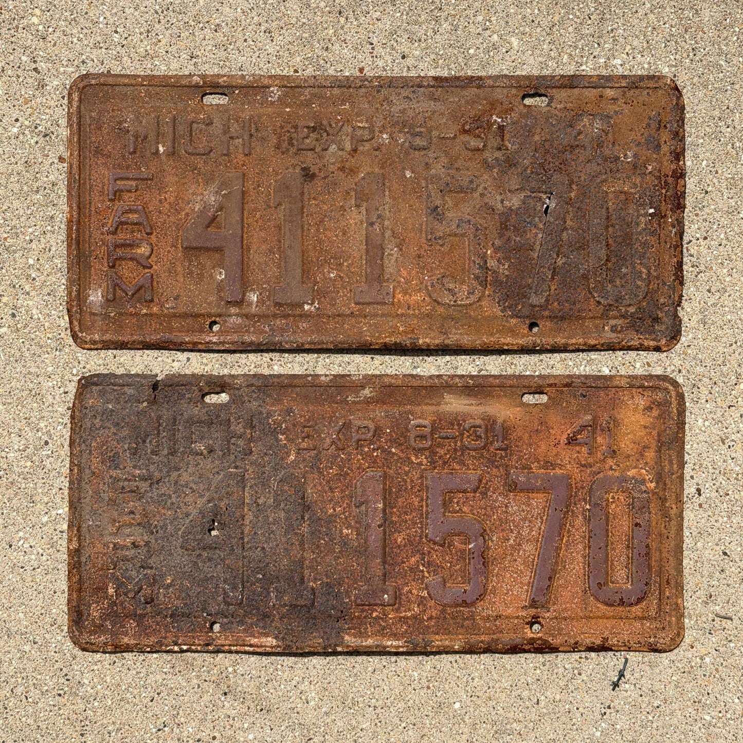 Photo of a 1941 Michigan Farm License Plate Pair Auto Tag Garage Decor Vintage Half Year 411 570 with original patina