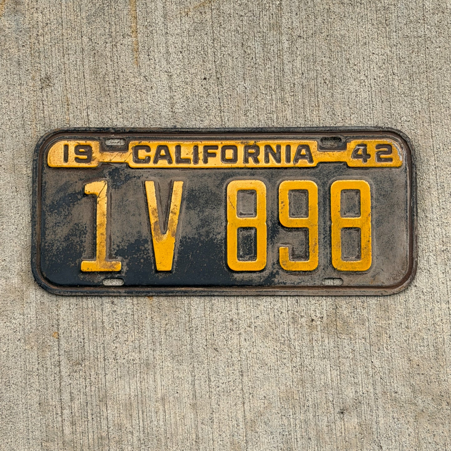 Photo of a 1942 California License Plate Auto Tag Garage Decor Vintage Natural Base 1 V 898 with original patina