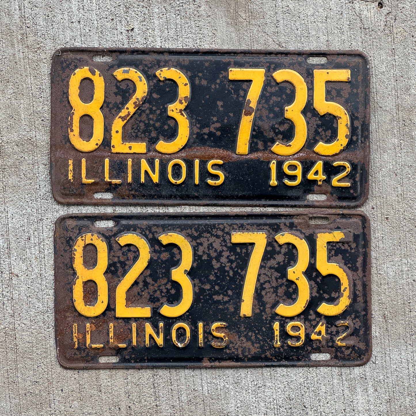 Photo of a 1942 Illinois License Plate Pair Auto Tag Garage Decor Vintage 823 735 with original patina