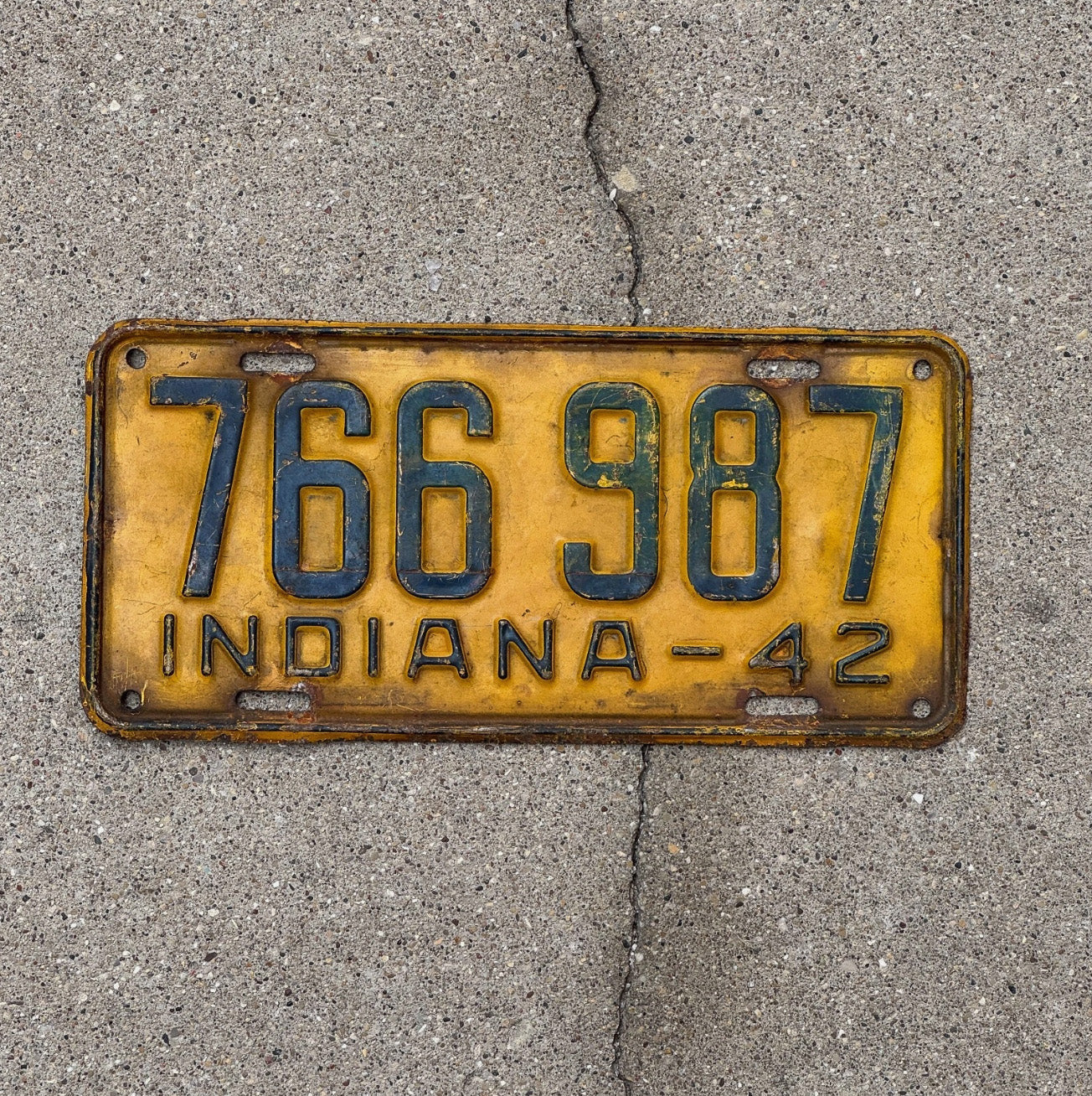 Photo of a 1942 Indiana License Plate Auto Tag Garage Decor Vintage 766 987