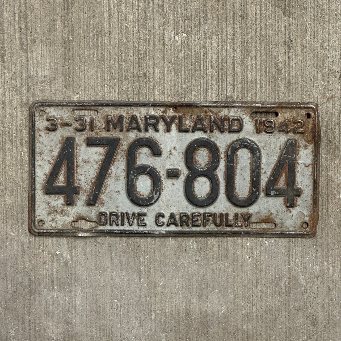 Photo of a 1942 Maryland License Plate Auto Tag Garage Decor Vintage 476 804 with original patina