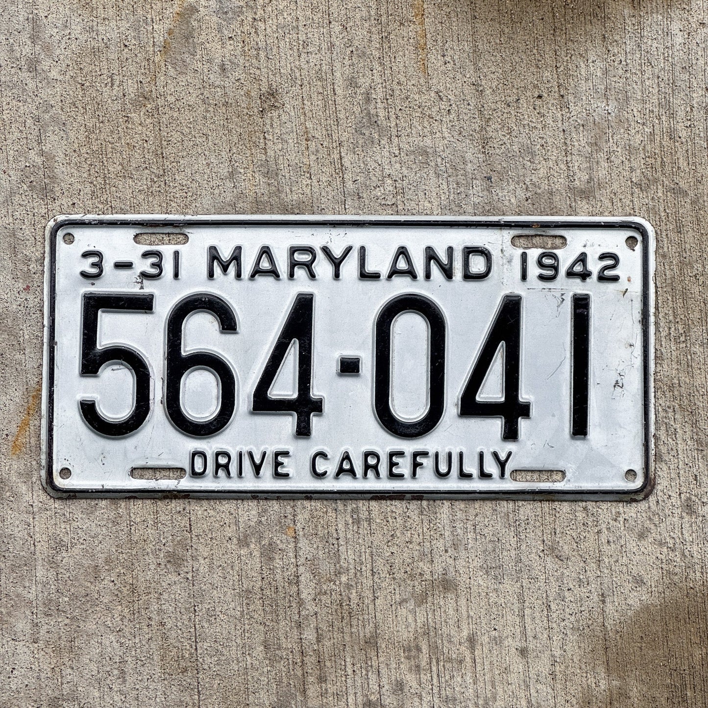 Photo of a 1942 Maryland License Plate Auto Tag Garage Decor Vintage High Quality 564 041 with original patina