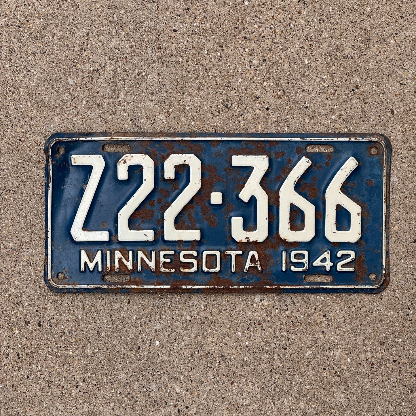 Photo of a 1942 Minnesota TRAILER License Plate Auto Tag Garage Decor Vintage Blue White Z 22366