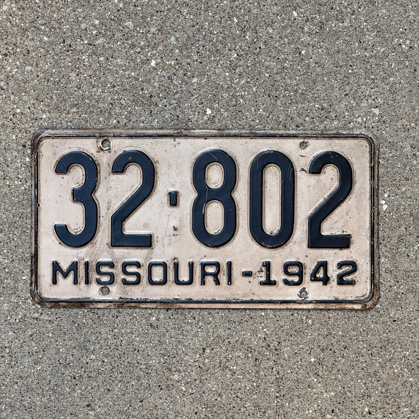 Photo of a 1942 Missouri License Plate Auto Tag Garage Decor Vintage 32 802