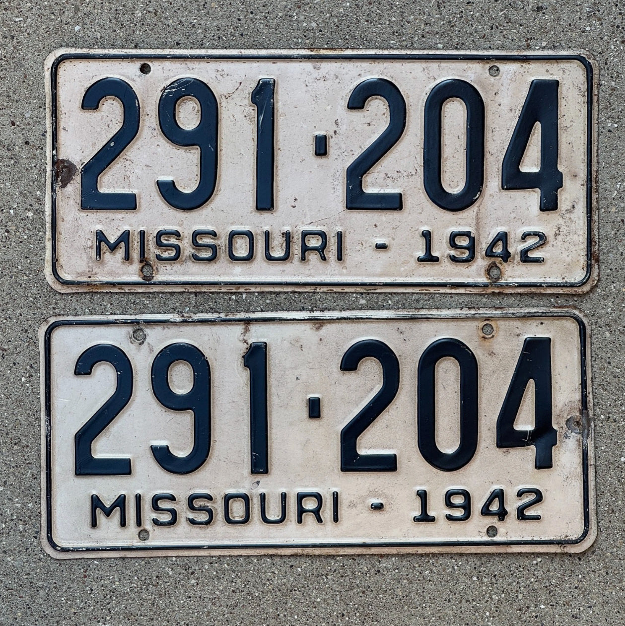 Photo of a 1942 Missouri License Plate Pair Auto Tag Garage Decor Vintage 291 204 with original patina