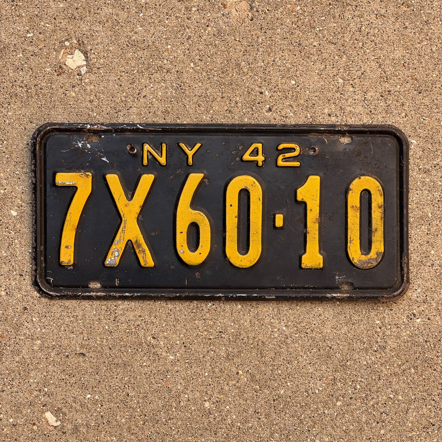 Photo of a 1942 New York License Plate Auto Tag Garage Decor Vintage 7X 6010