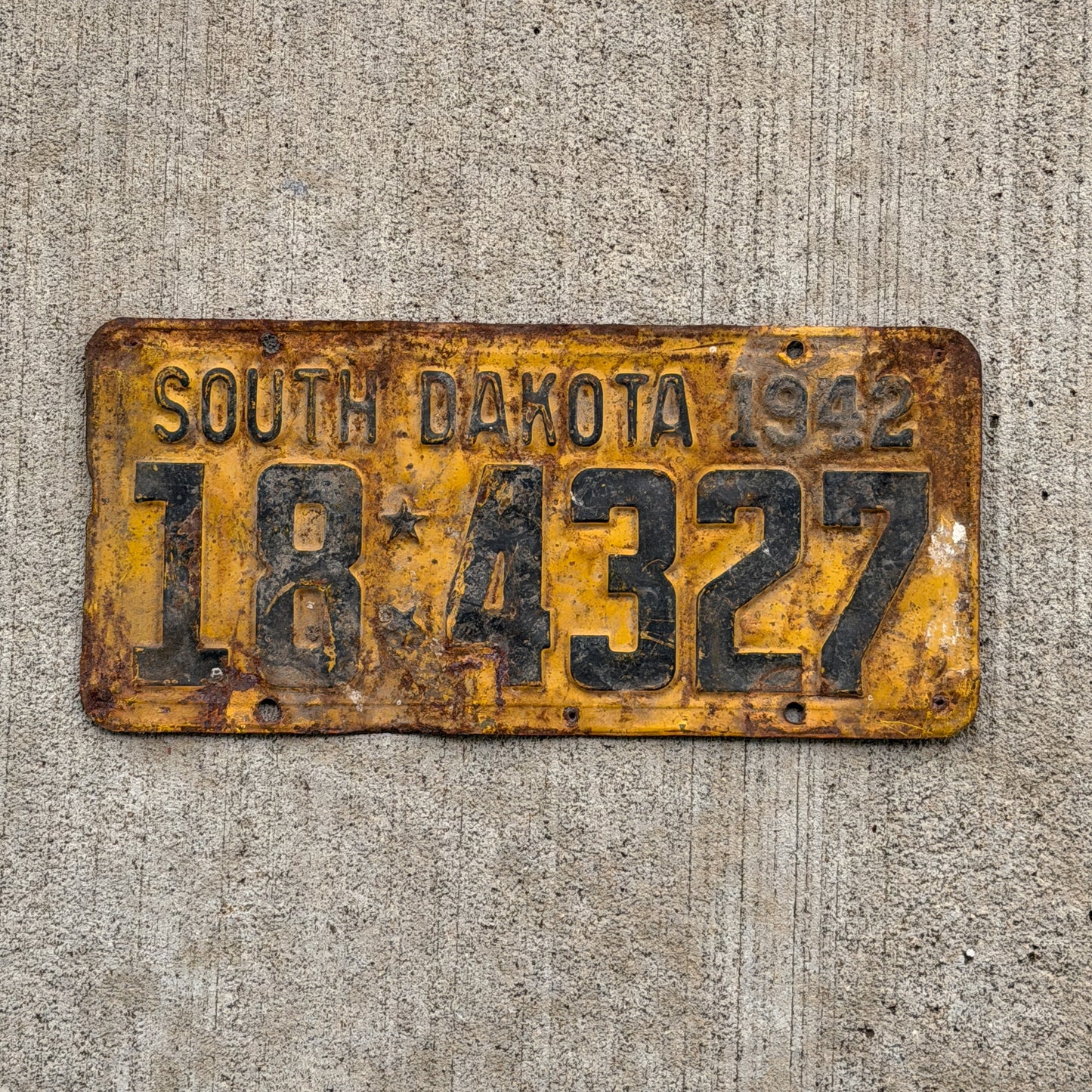 Photo of a 1942 South Dakota License Plate Auto Tag Garage Decor Vintage 18 4327 with original patina