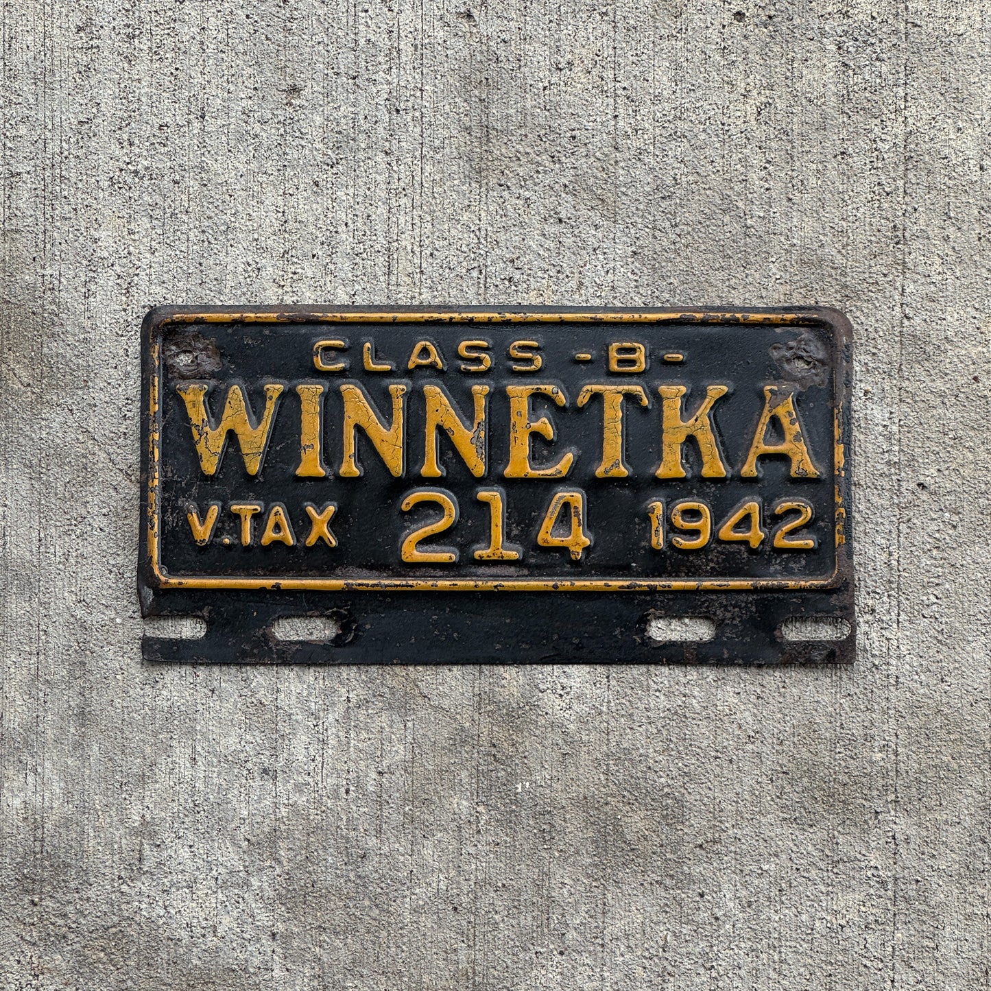 Photo of a 1942 Winnetka Illinois Tax Tag License Plate Topper Auto Tag Garage Decor Vintage Class B 214 with original patina
