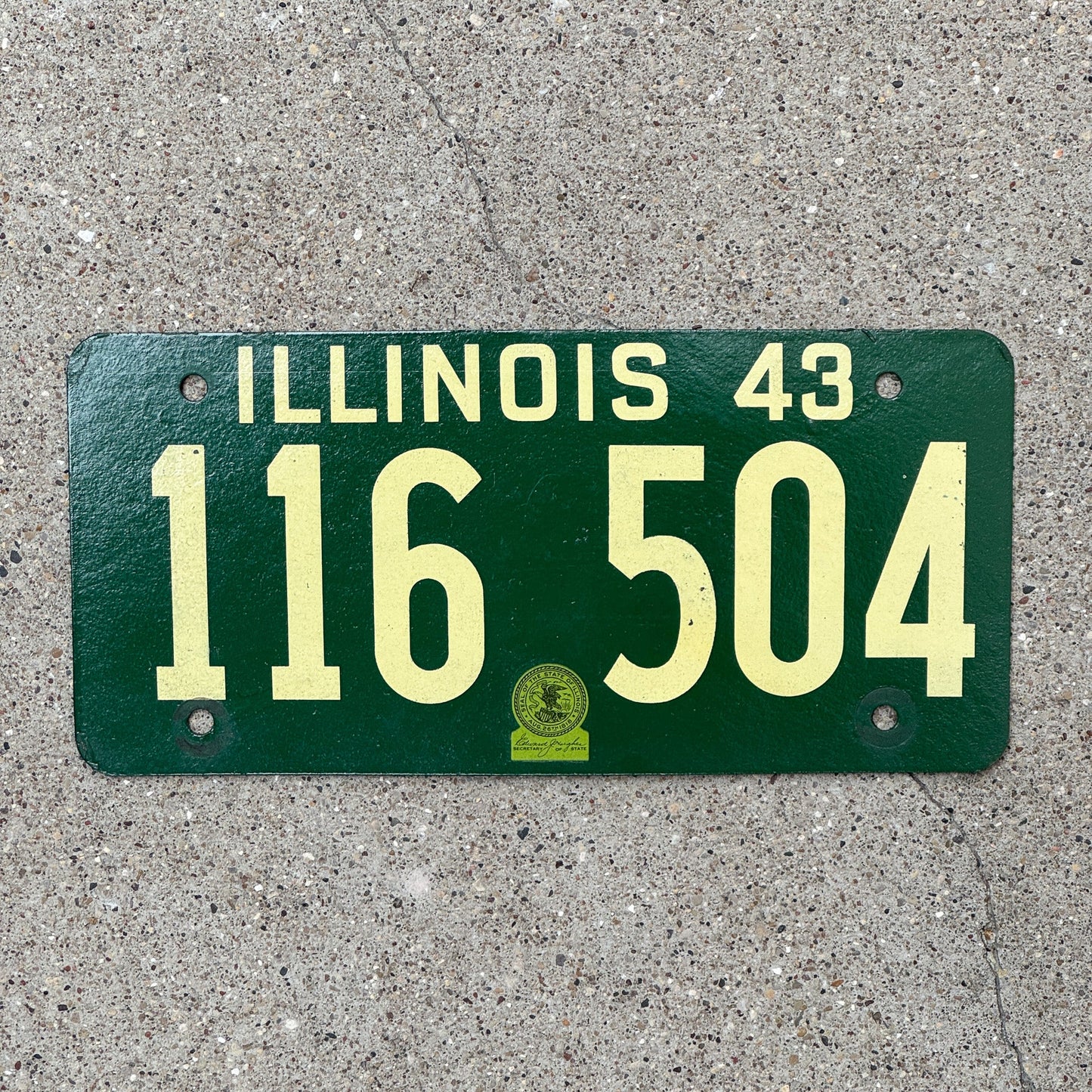 Photo of a 1943 Illinois License Plate Auto Tag Garage Decor Vintage Fiberboard State Seal 116 504 with original patina