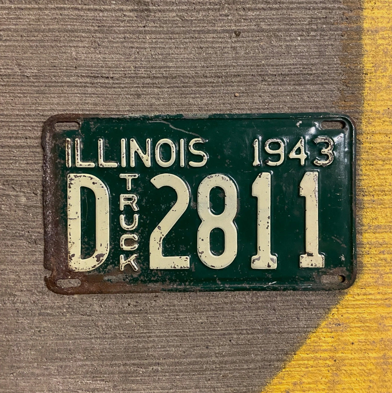 Photo of a 1943 Illinois Truck License Plate Auto Tag Garage Decor Vintage D 2811 with original patina