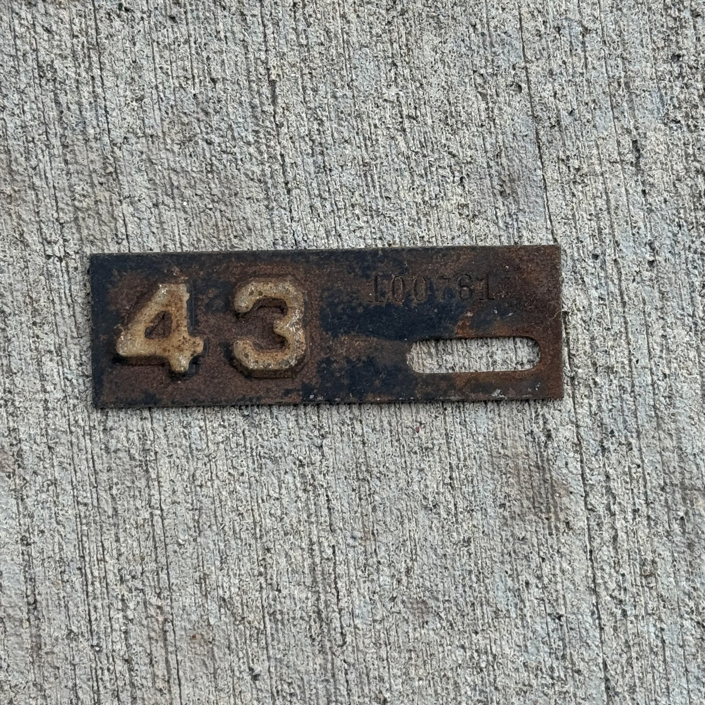 Photo of a 1943 New Jersey Tab License Plate Auto Tag 1 Vintage 100761 with original patina