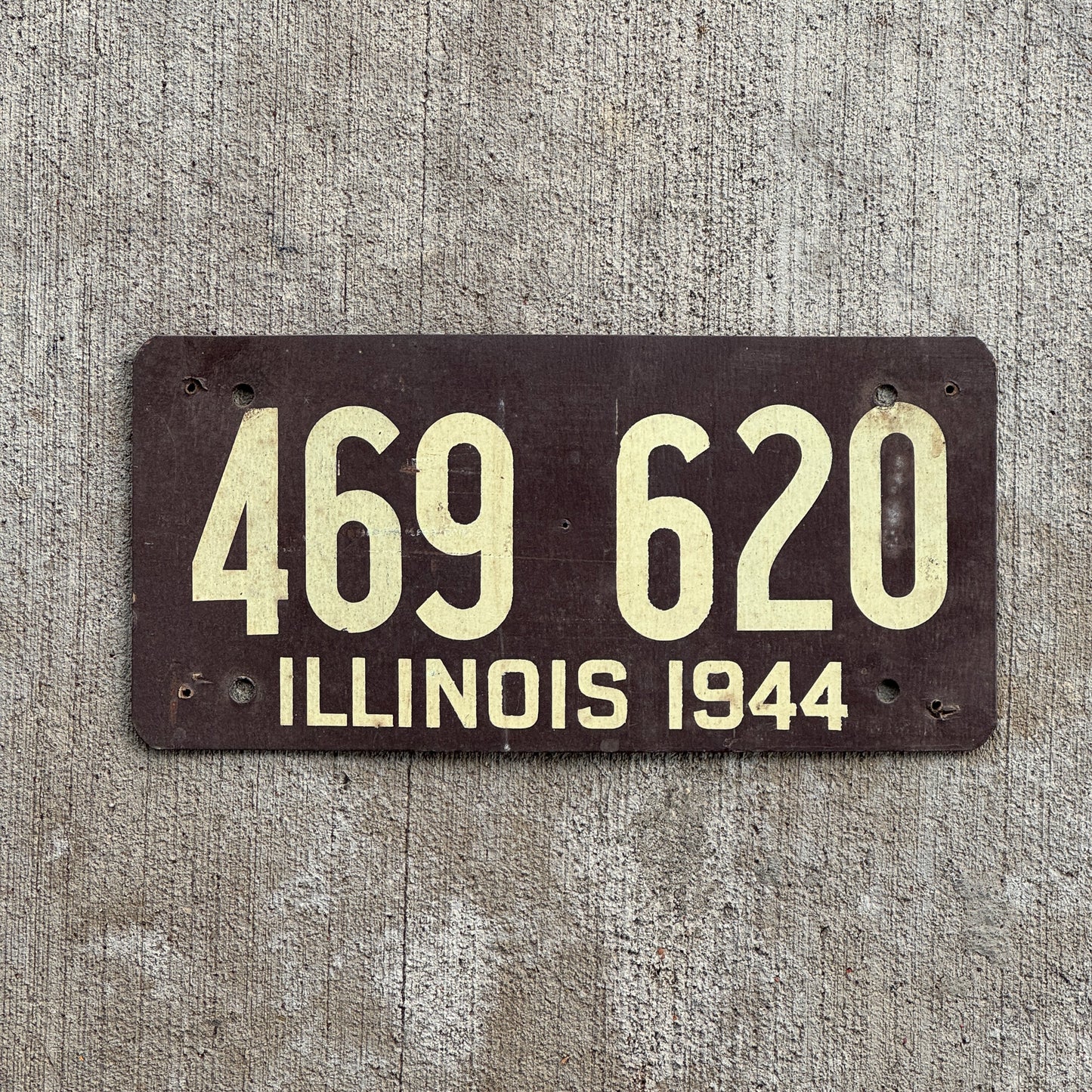 Photo of a 1944 Illinois Fiberboard License Plate Auto Tag Garage Decor Vintage 469 620 with original patina