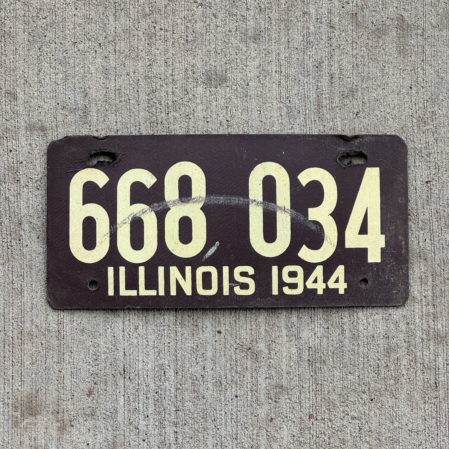 Photo of a 1944 Illinois Fiberboard License Plate Auto Tag Garage Decor Vintage 668 034 with original patina