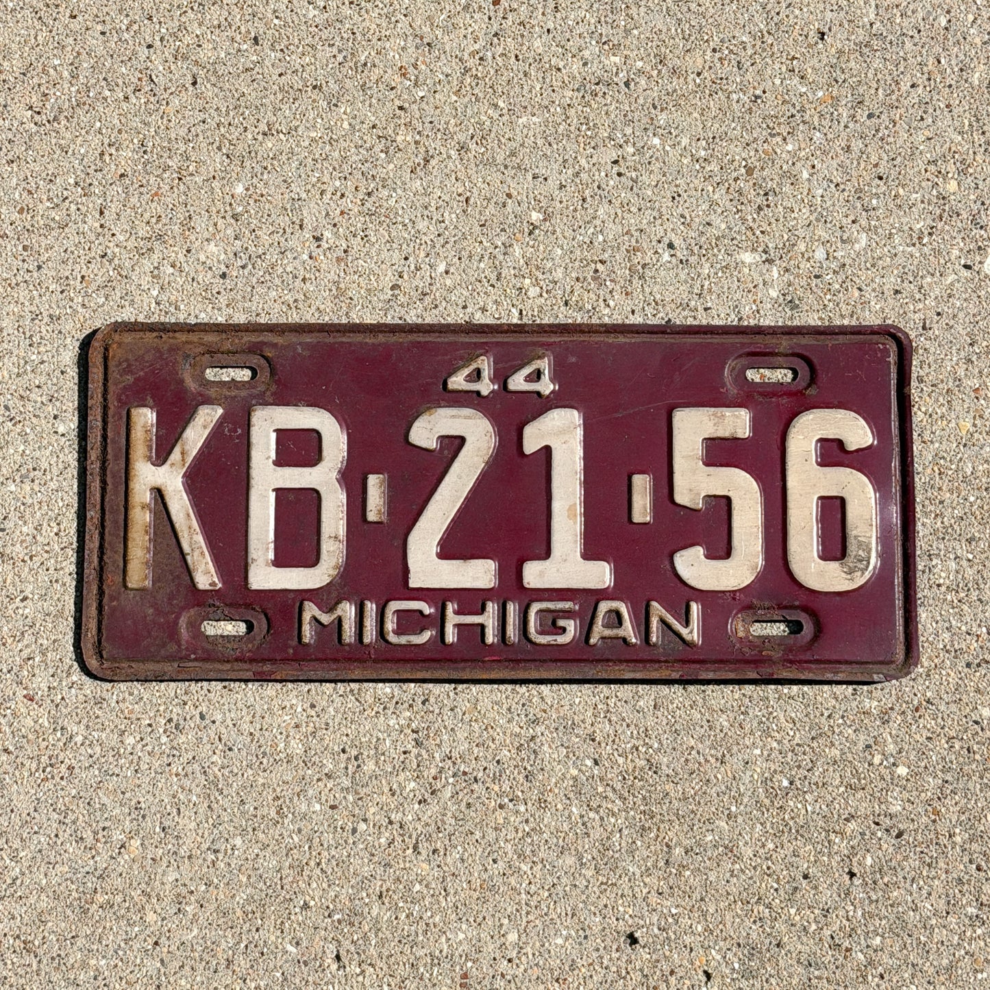 Photo of a 1944 Michigan License Plate Auto Tag Garage Decor Vintage KB 21 56 with original patina