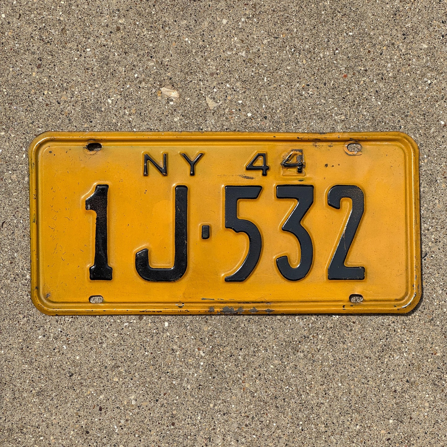Photo of a 1944 New York License Plate Auto Tag Garage Decor Vintage Restamp WWII 1J 532