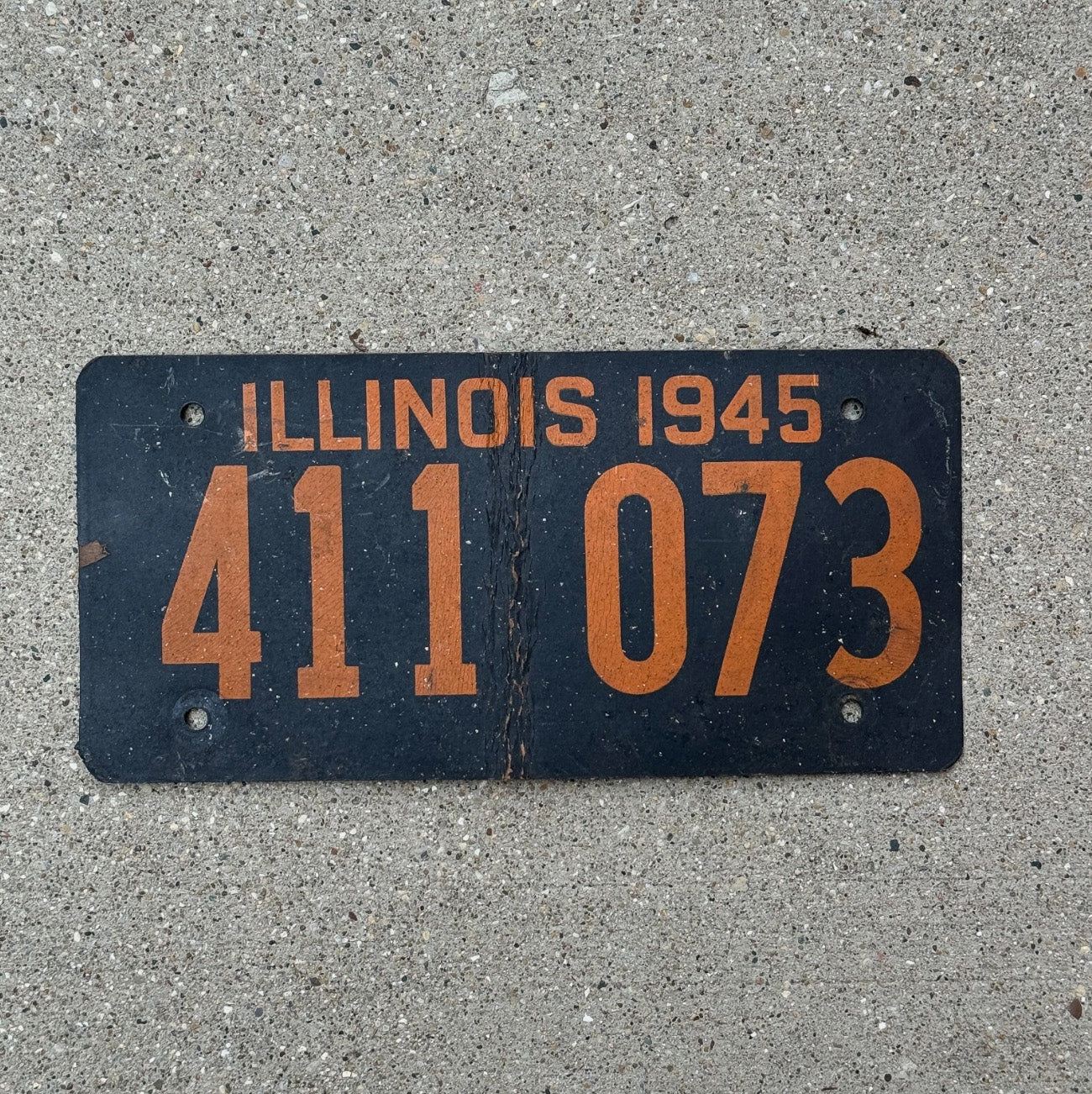 Photo of a 1945 Illinois Fiber Board License Plate Auto Tag Garage Decor Vintage Soy 411 073