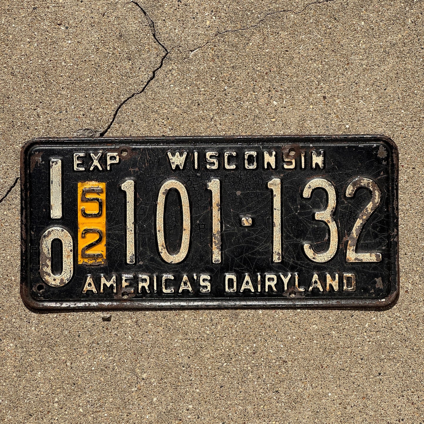 Photo of a 1946 1952 Wisconsin License Plate Auto Tag Garage Decor Vintage Square Base Issued in 1950 10 101 132