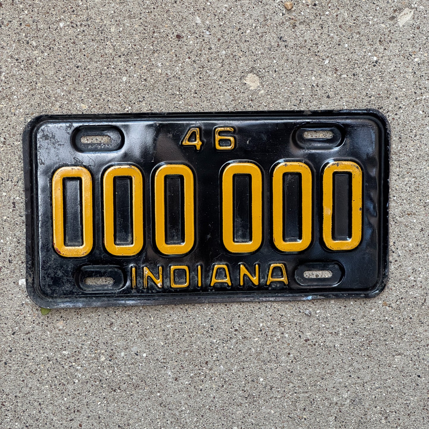 Photo of a 1946 Indiana Sample License Plate Auto Tag 2 Garage Decor 000 000 with original patina