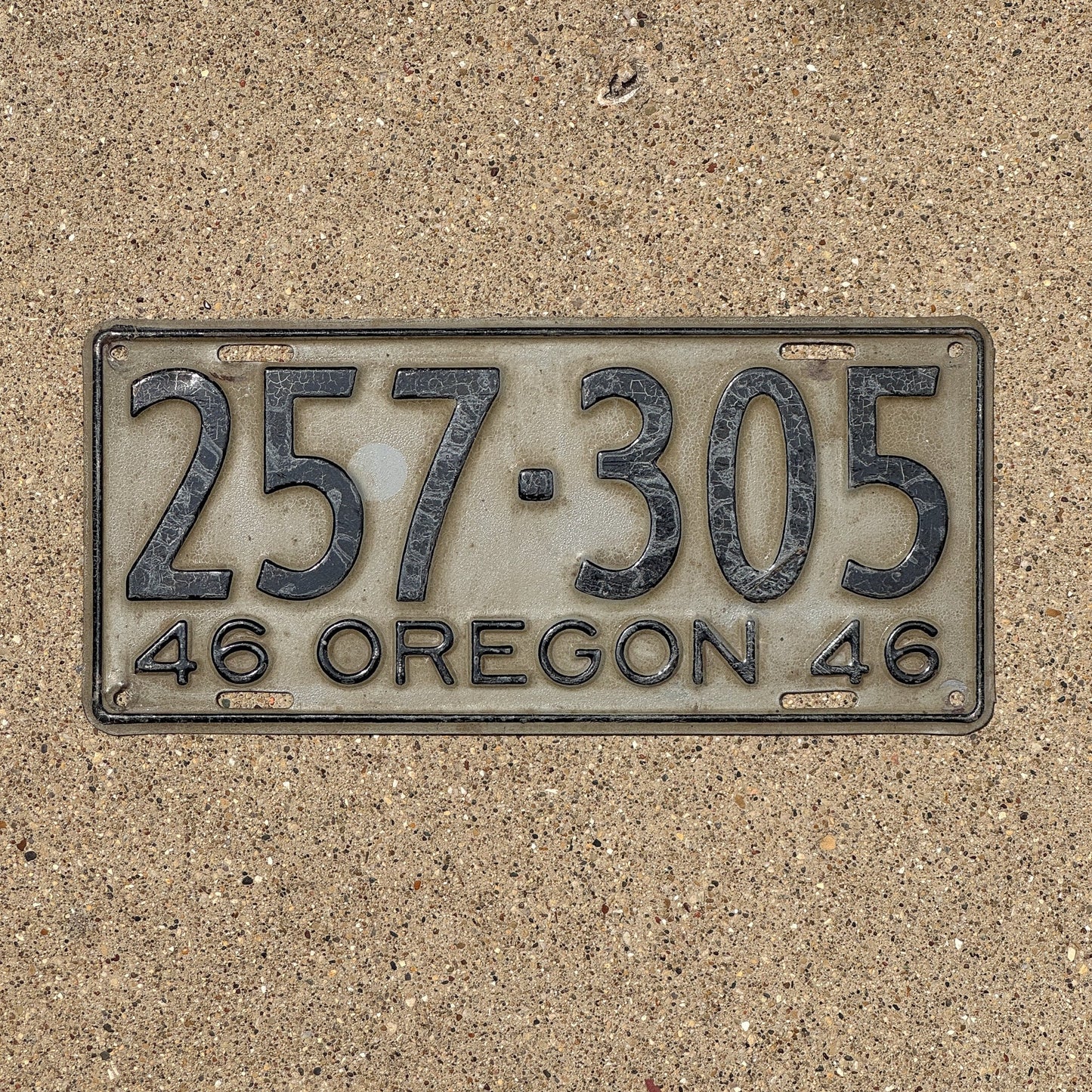 Photo of a 1946 Oregon License Plate Auto Tag Garage Decor Vintage 257 305