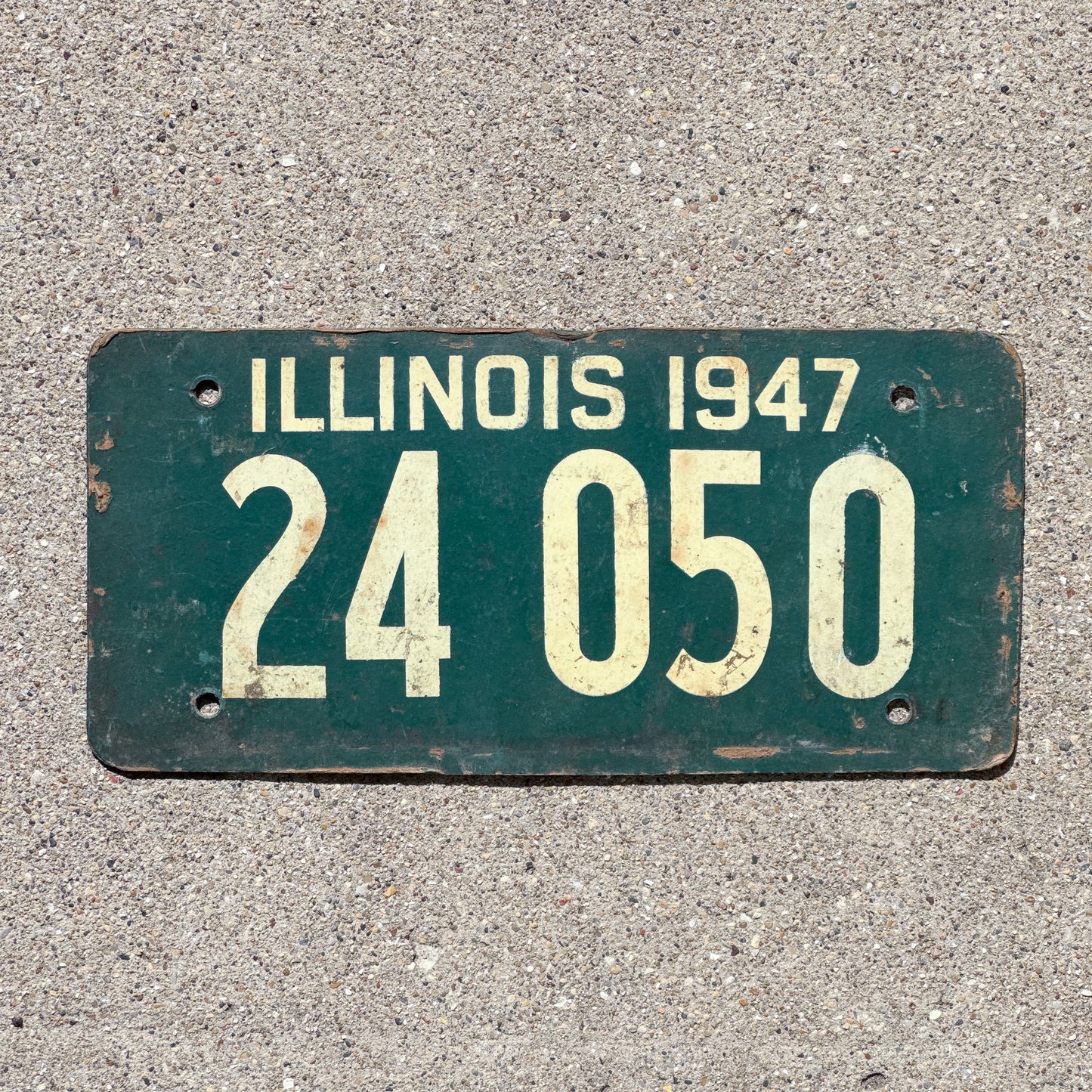 Photo of a 1947 Illinois Fiberboard License Plate Auto Tag Garage Decor Vintage WWII Year 24 050 with original patina