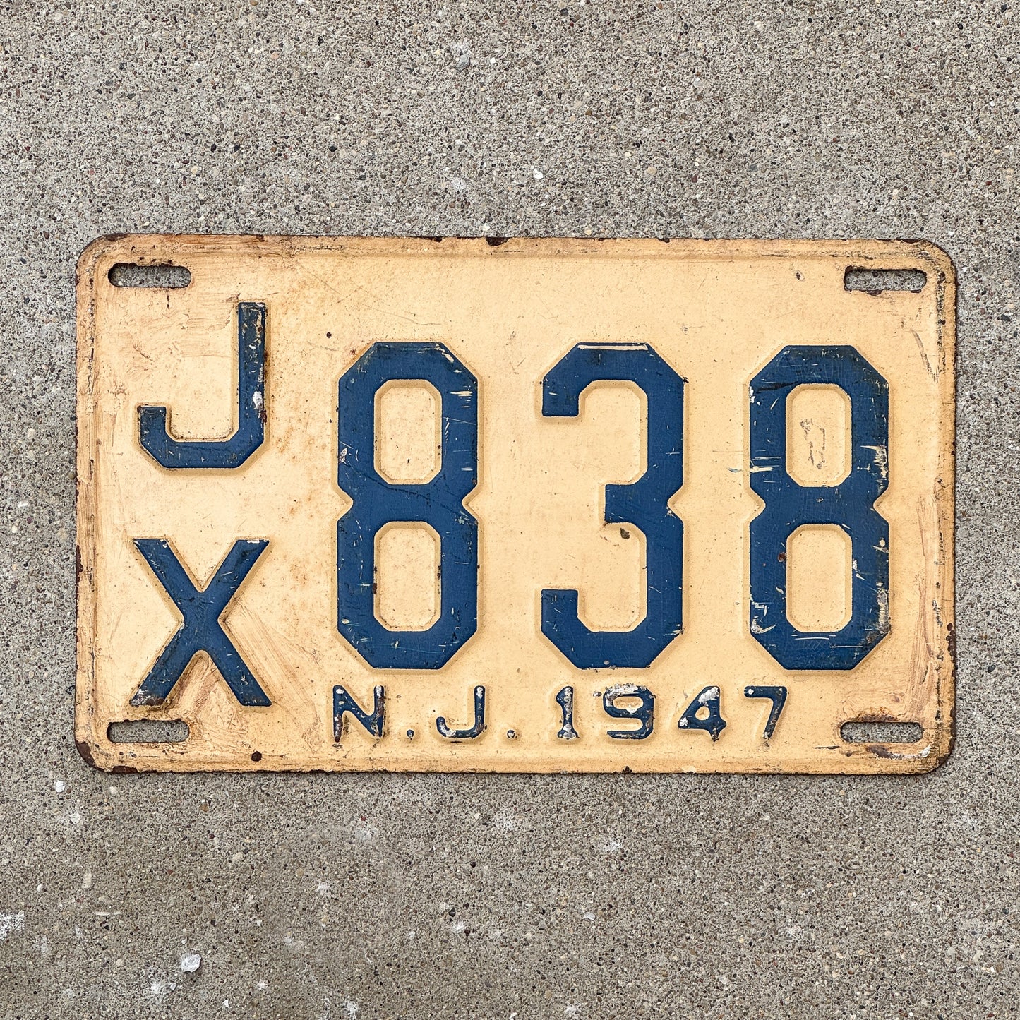 Photo of a 1947 New Jersey License Plate Auto Tag Garage Decor Vintage JX 838 with original patina