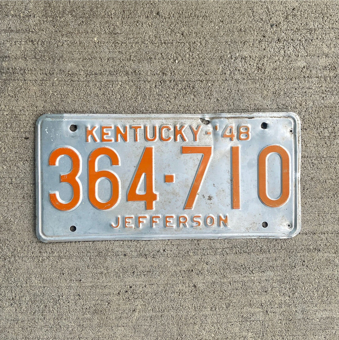 Photo of a 1948 Kentucky License Plate Auto Tag Garage Decor Vintage 364 710 with original patina
